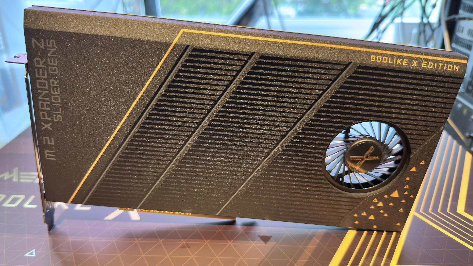 A photo showing an MSI M.2 Xpander-Z Slider adapter card, standing on its edge