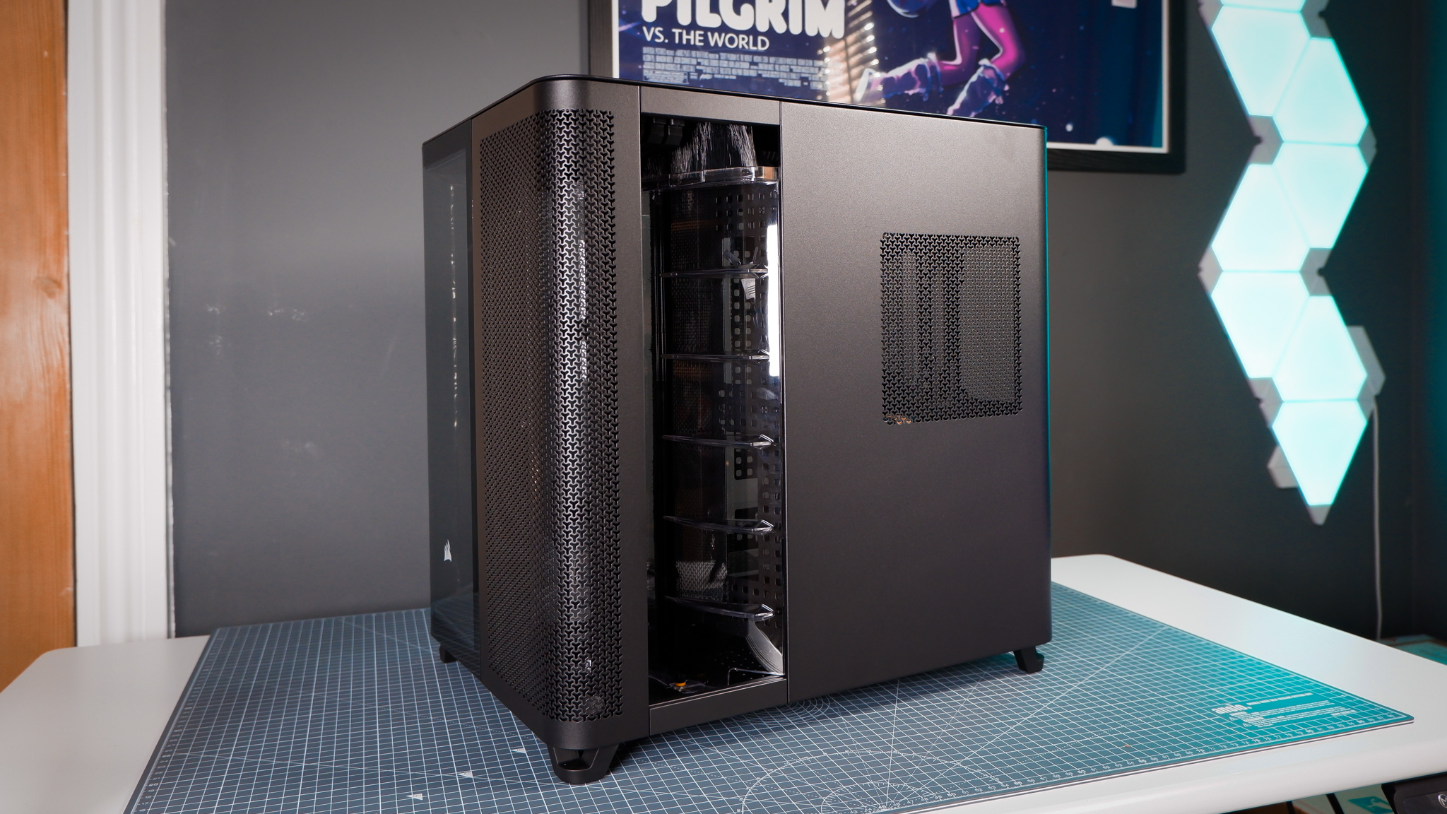 A Corsair Air 5400 PC case on a desk with various parts installed.
