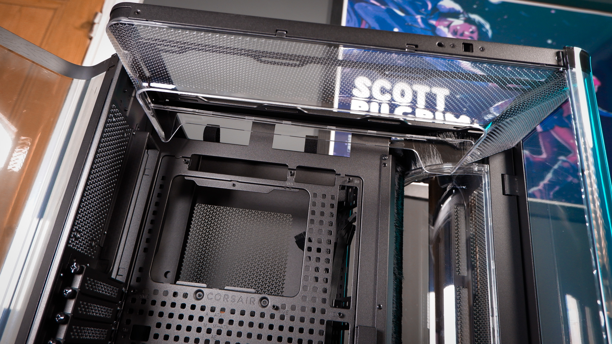 A Corsair Air 5400 PC case on a desk with various parts installed.