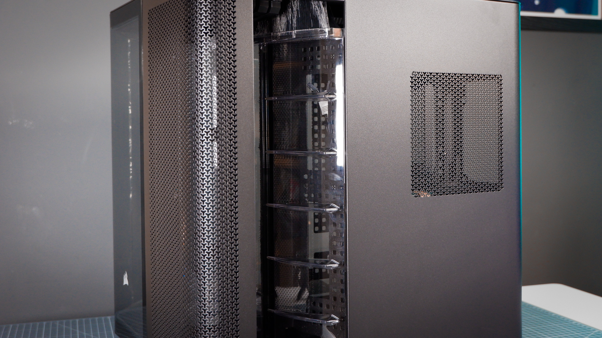 A Corsair Air 5400 PC case on a desk with various parts installed.