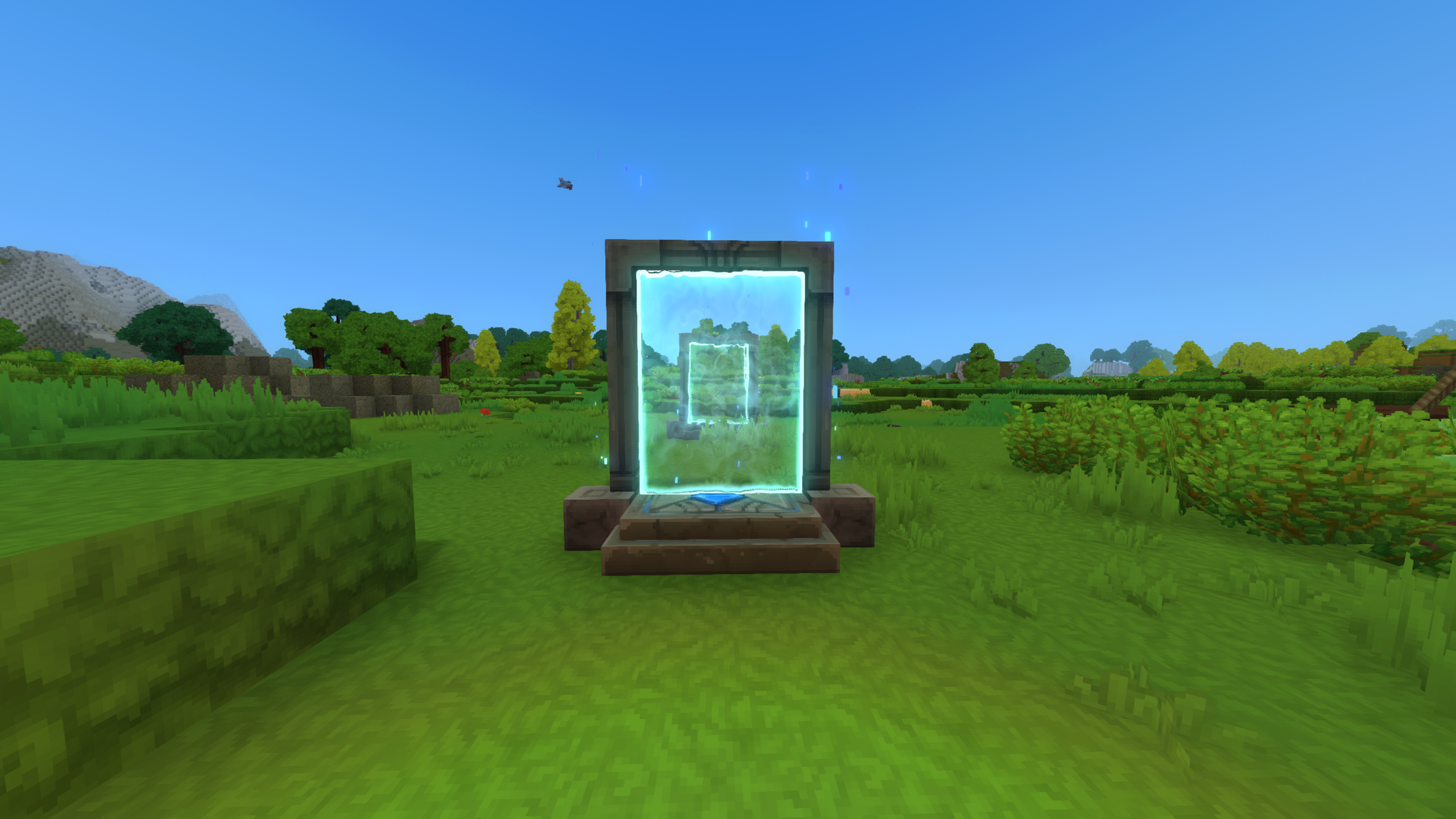 Hytale teleporter: Two teleporters in a grassy field, one placed a short distance behind the first.