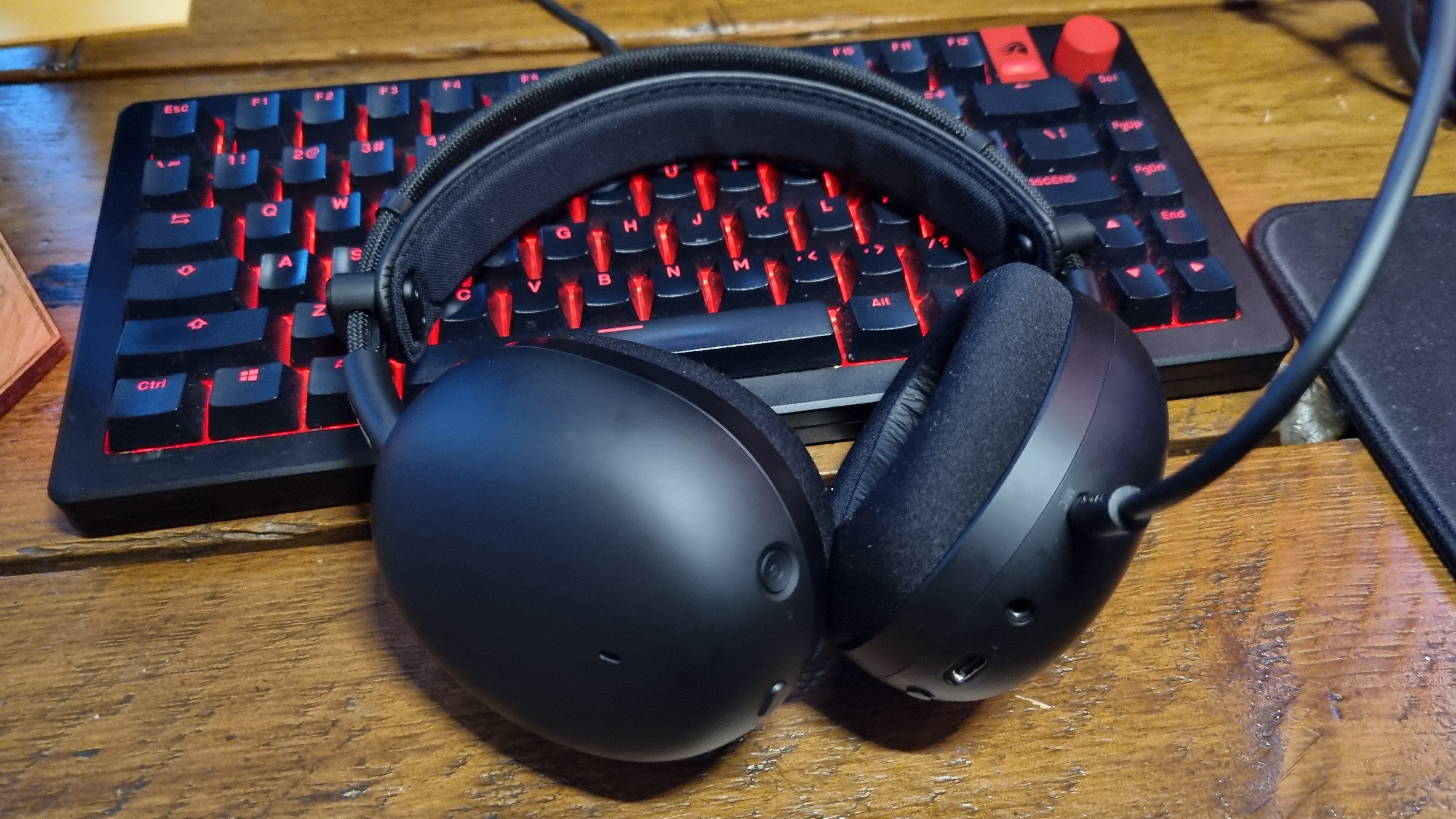 The Sony Inzone H9 II resting on an RGB-lit gaming keyboard