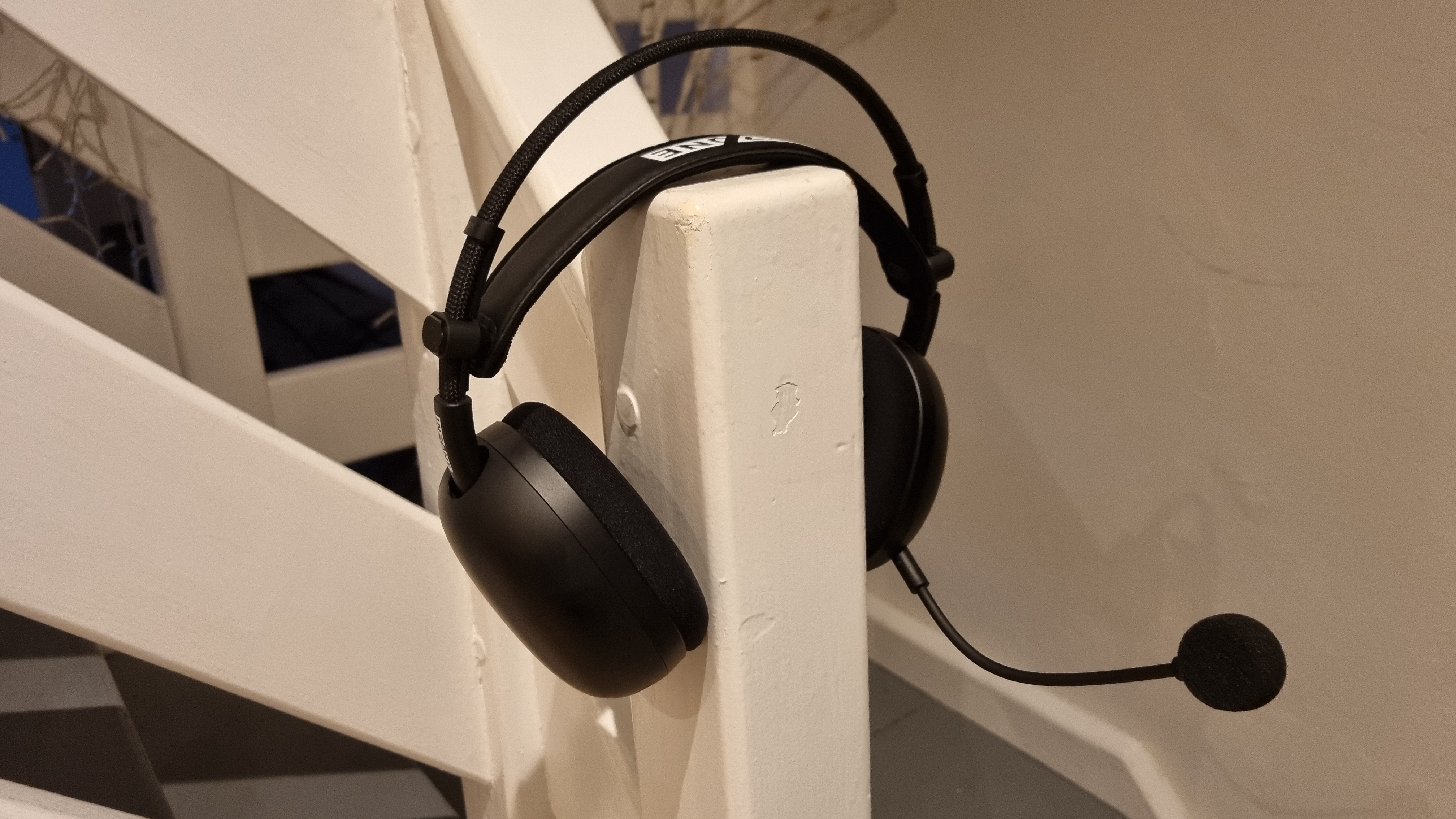 The Sony Inzone H9 II, positioned on a banister to show how it looks when worn