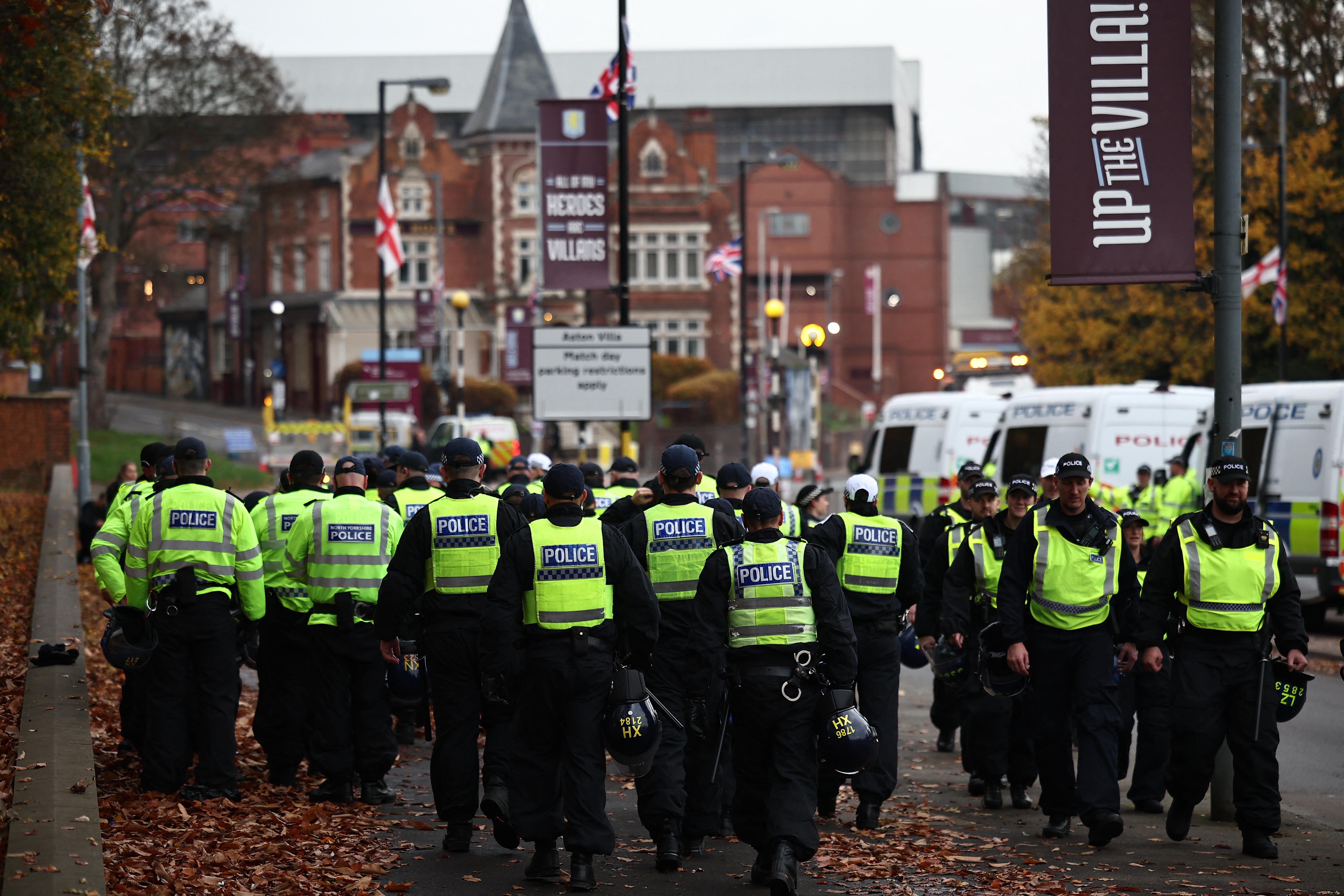 Police officers deploy near Villa Park where demonstrations are planned in Birmingham on November 6, 2025 ahead of the UEFA Europa League league-stage football match between Aston Villa and Maccabi Tel Aviv.