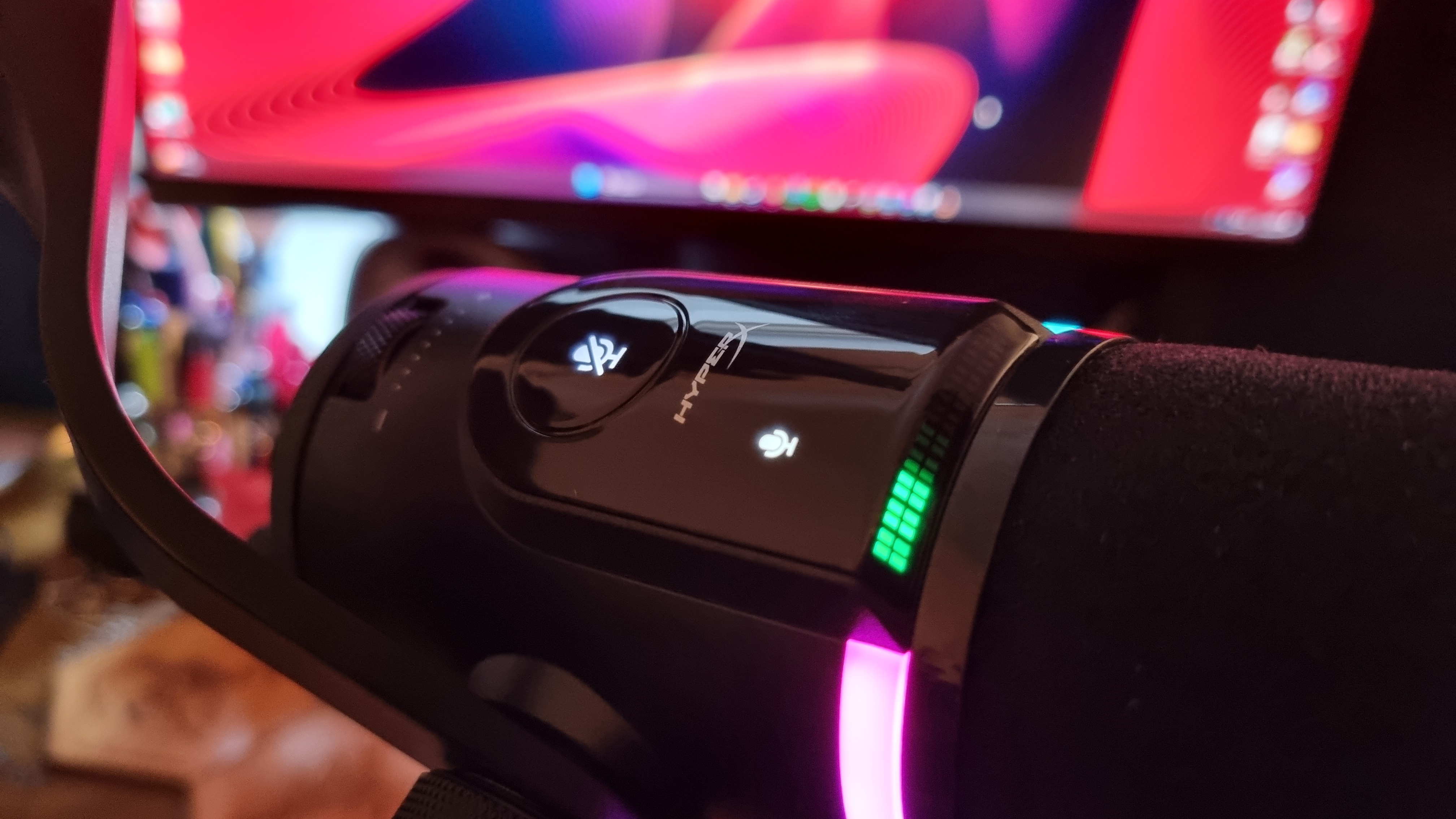 A HyperX FlipCast microphone shot from various angles to show the connection options and controls