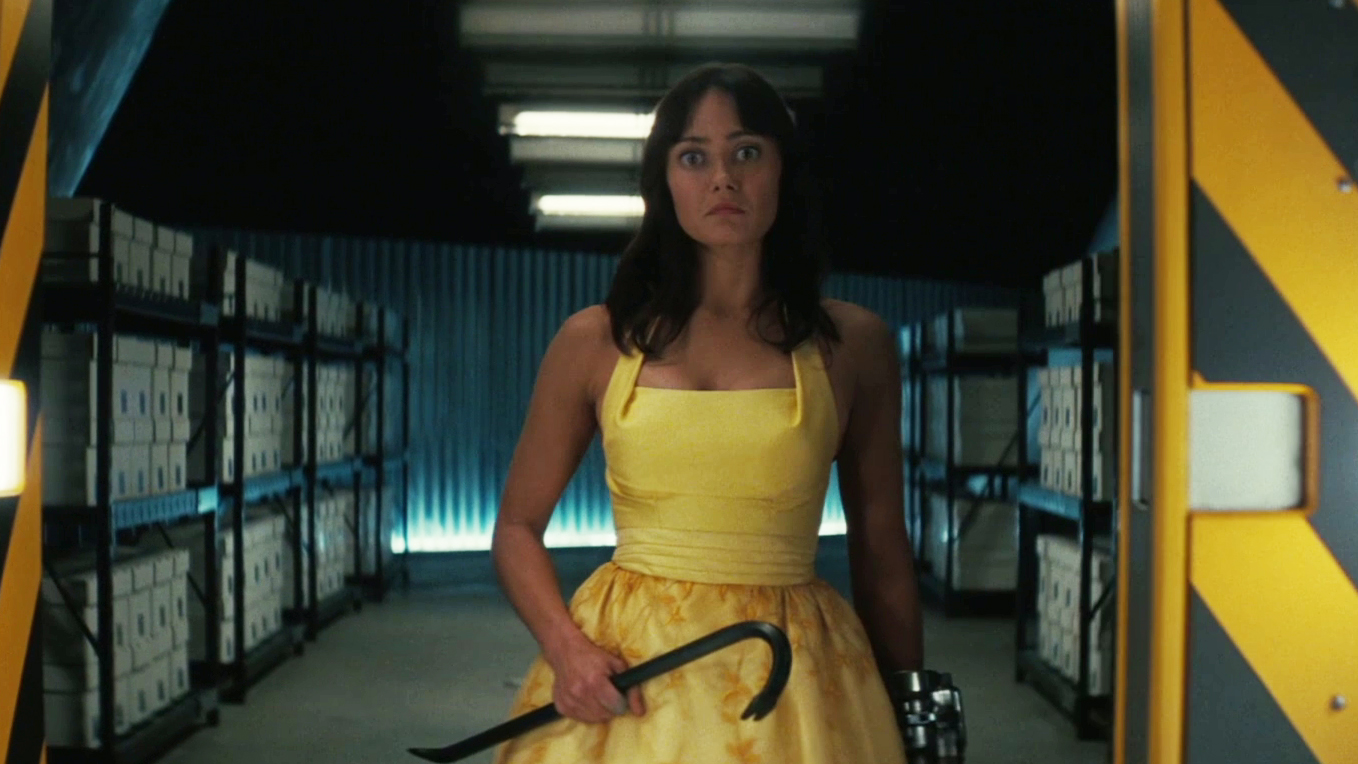 Lucy holding a crowbar