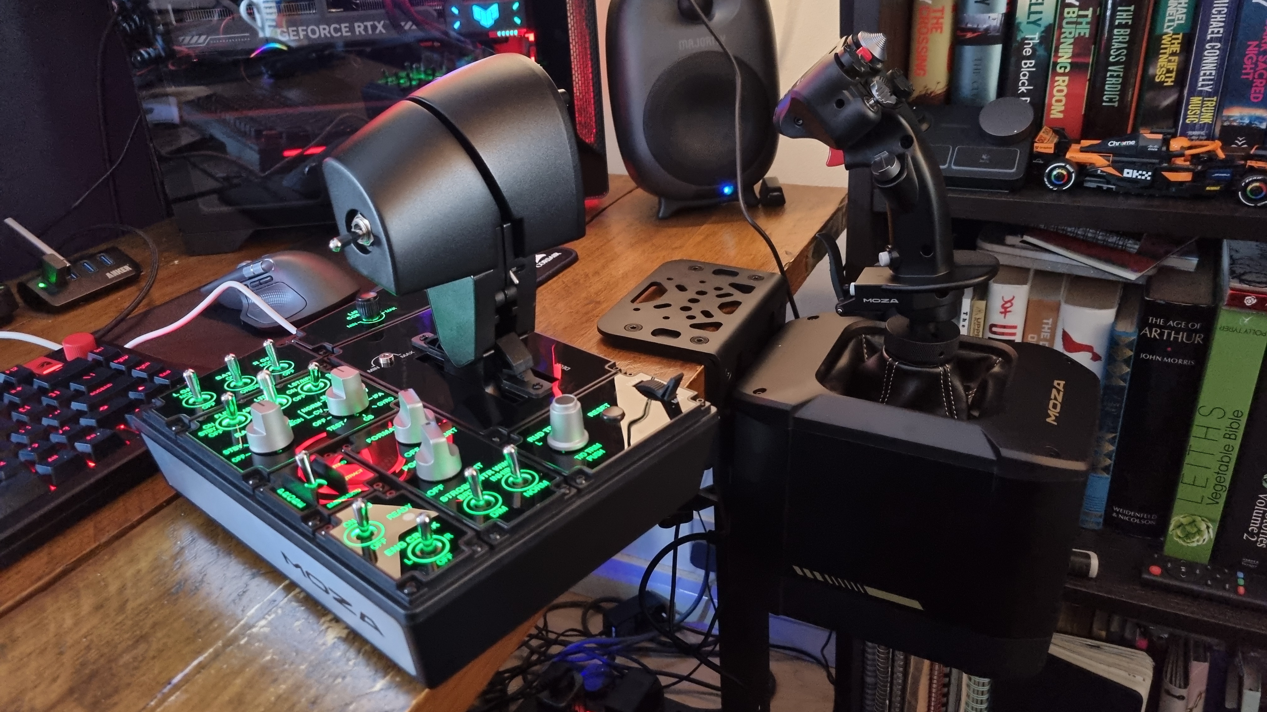 A full Moza flight sim setup, including a Moza MTP Throttle unit, a Moza AB9 FFB Base, and a Moza MH16 Flightstick