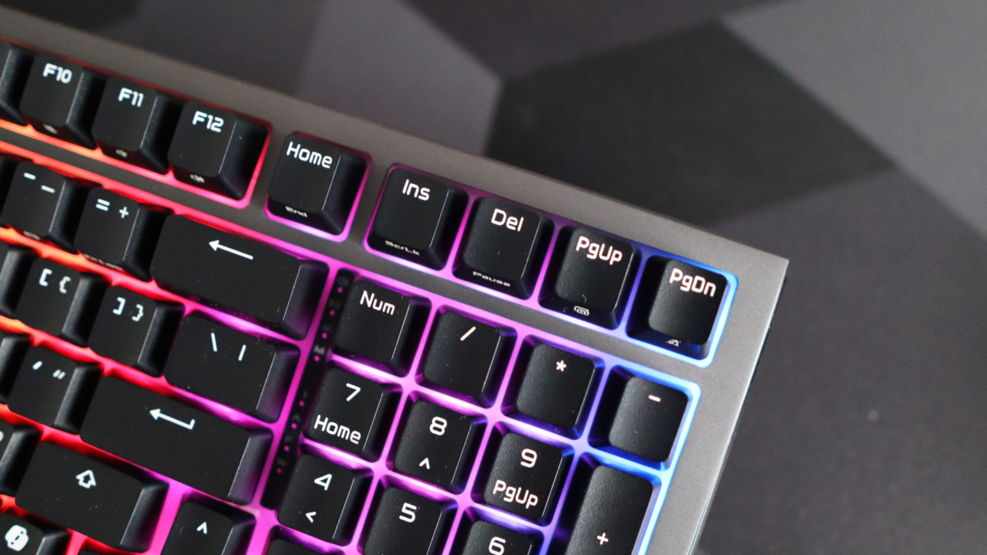 Asus ROG Strix Morph 96 Wireless on a desk mat.