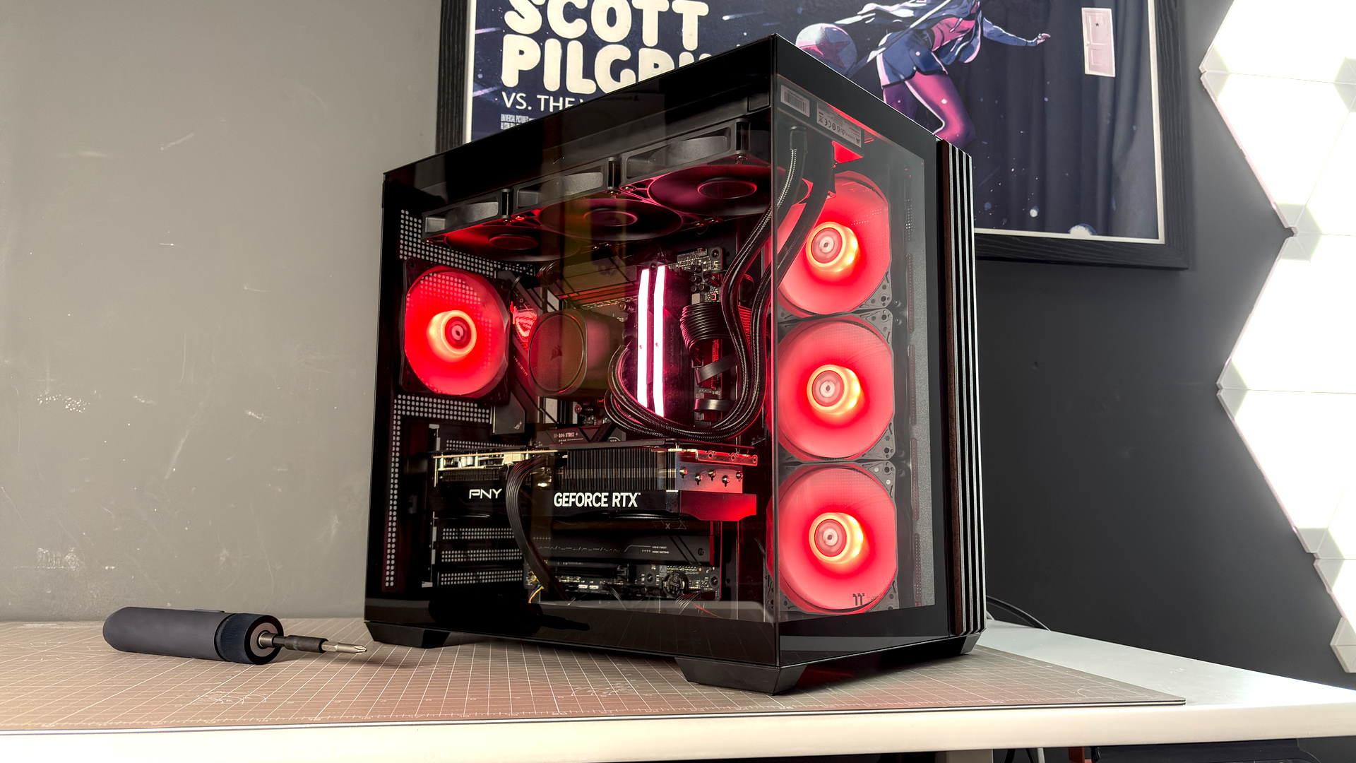 The Thermaltake View 380 WS ARGB on a desk with various components fitted.