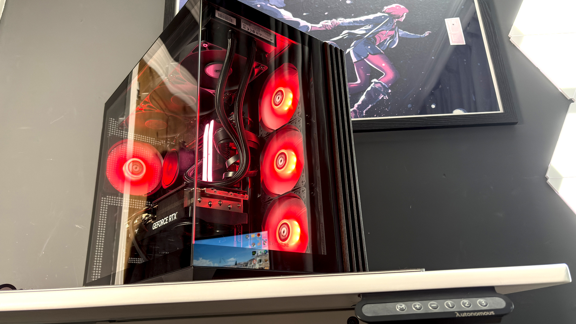 The Thermaltake View 380 WS ARGB on a desk with various components fitted.