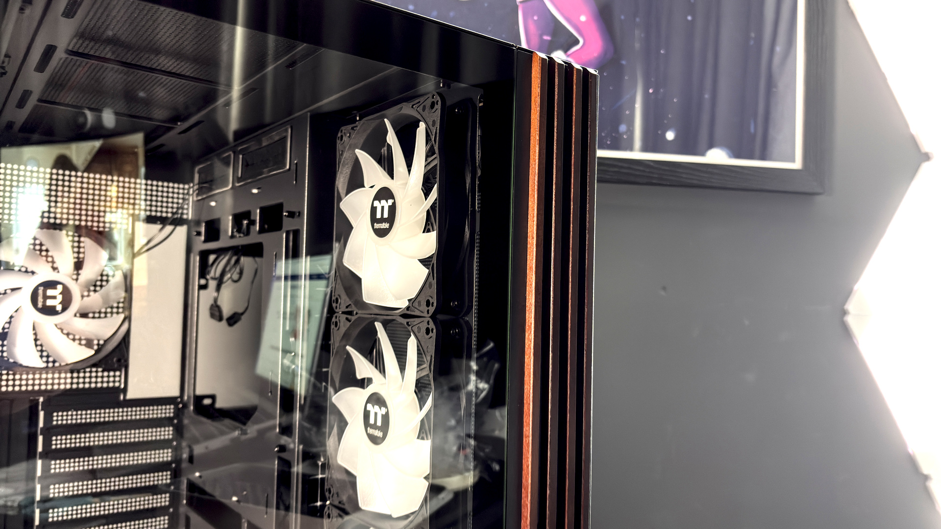 The Thermaltake View 380 WS ARGB on a desk with various components fitted.