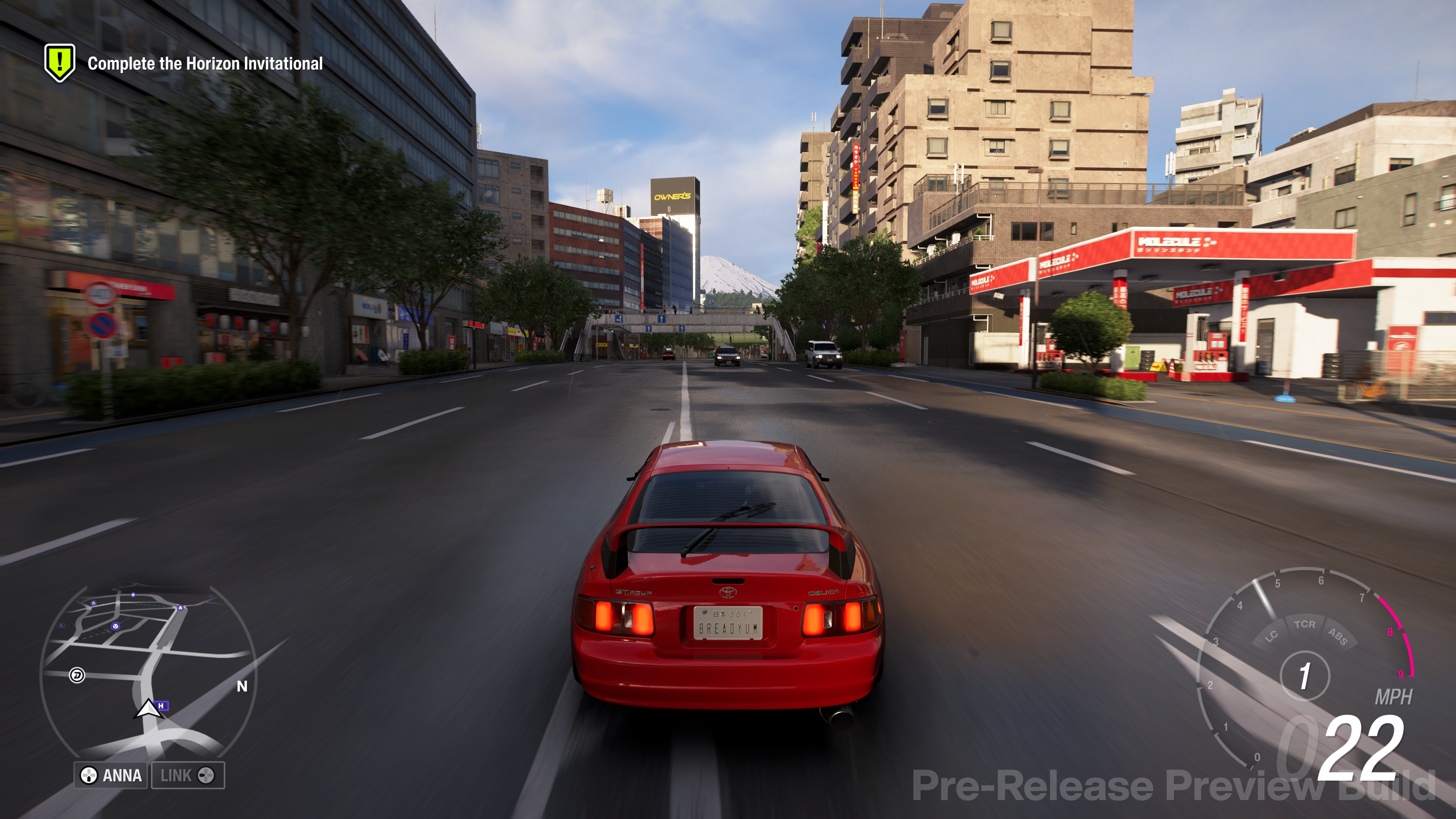 A car drives a suburban highway