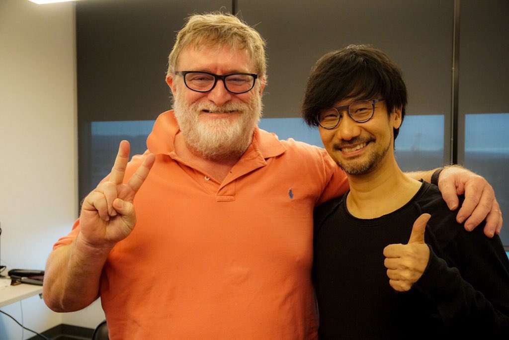 Hideo Kojima and Gabe Newell posing for the camera.