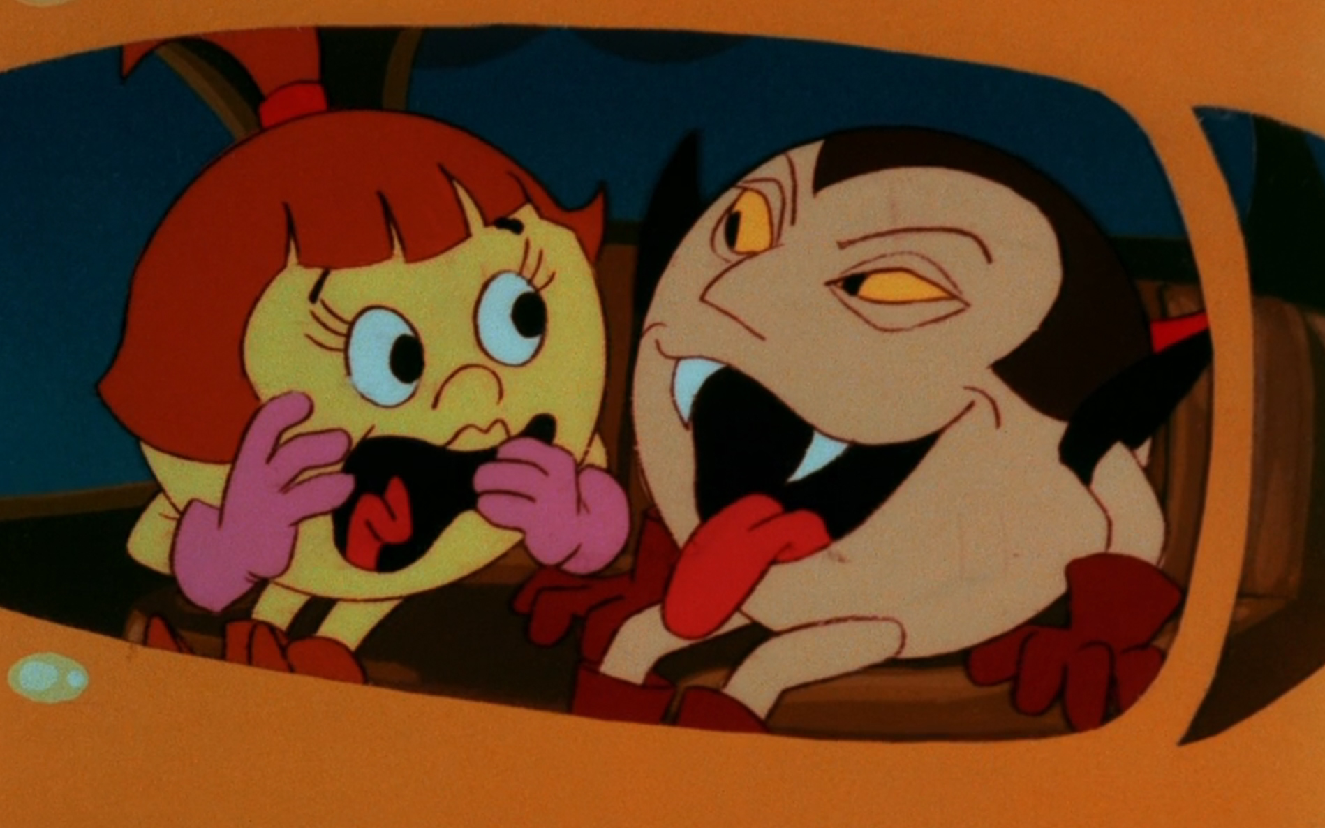 A Pac-Vampire trying to bite a Ms. Pac-Man person