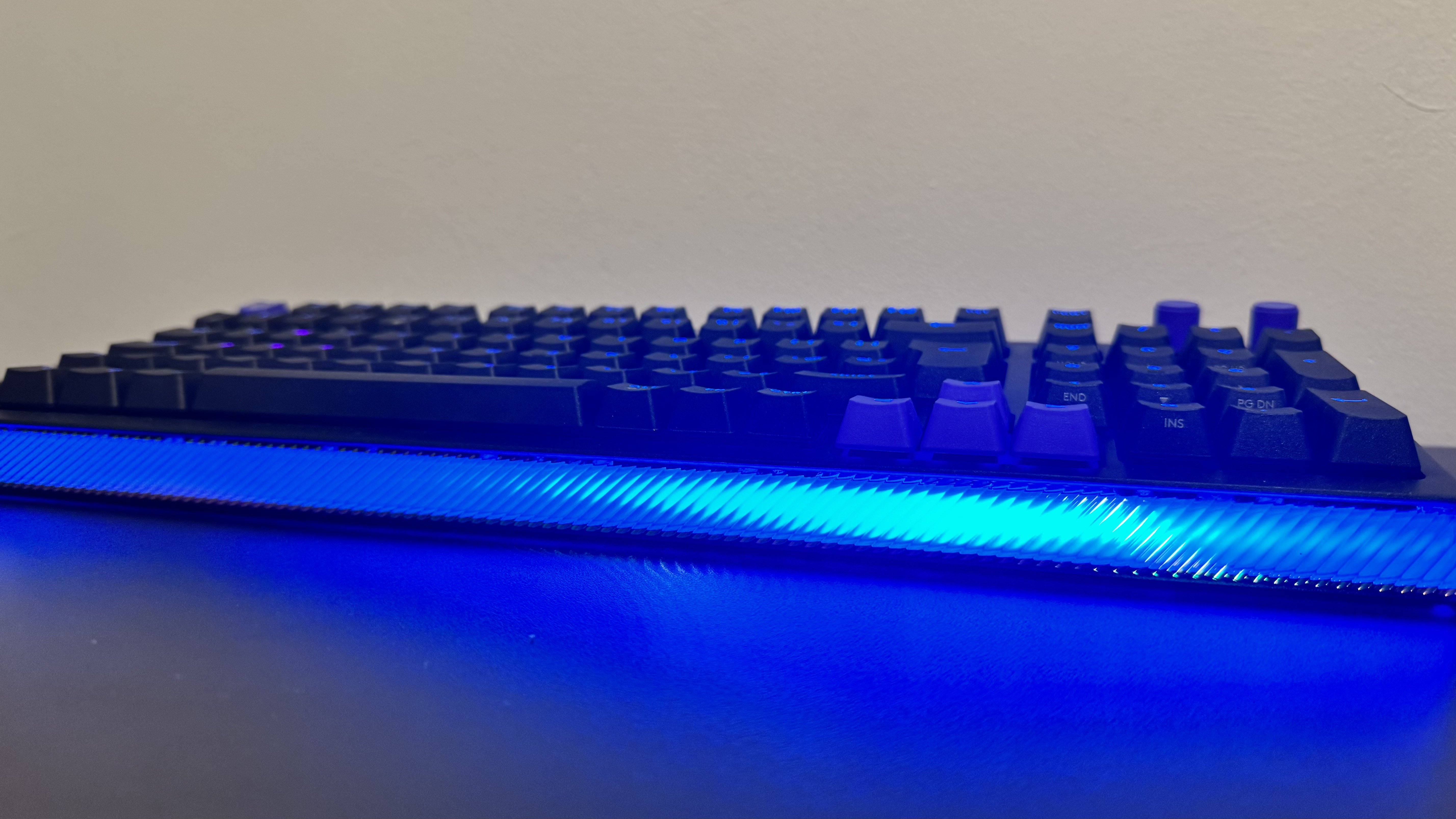 The Logitech G512 X gaming keyboard from the bottom, showing the light bar