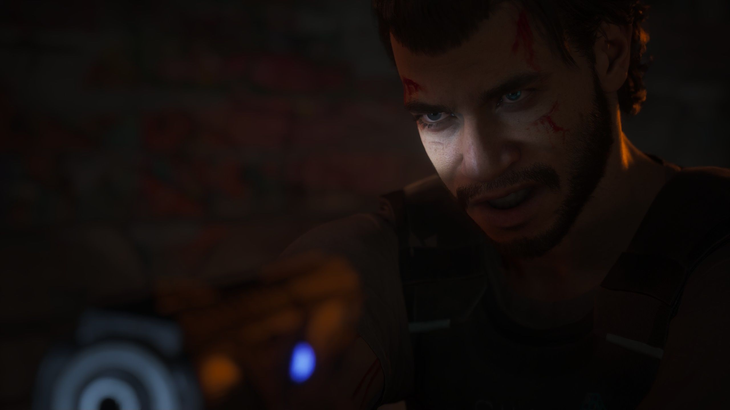 Jacob points a futuristic pistol