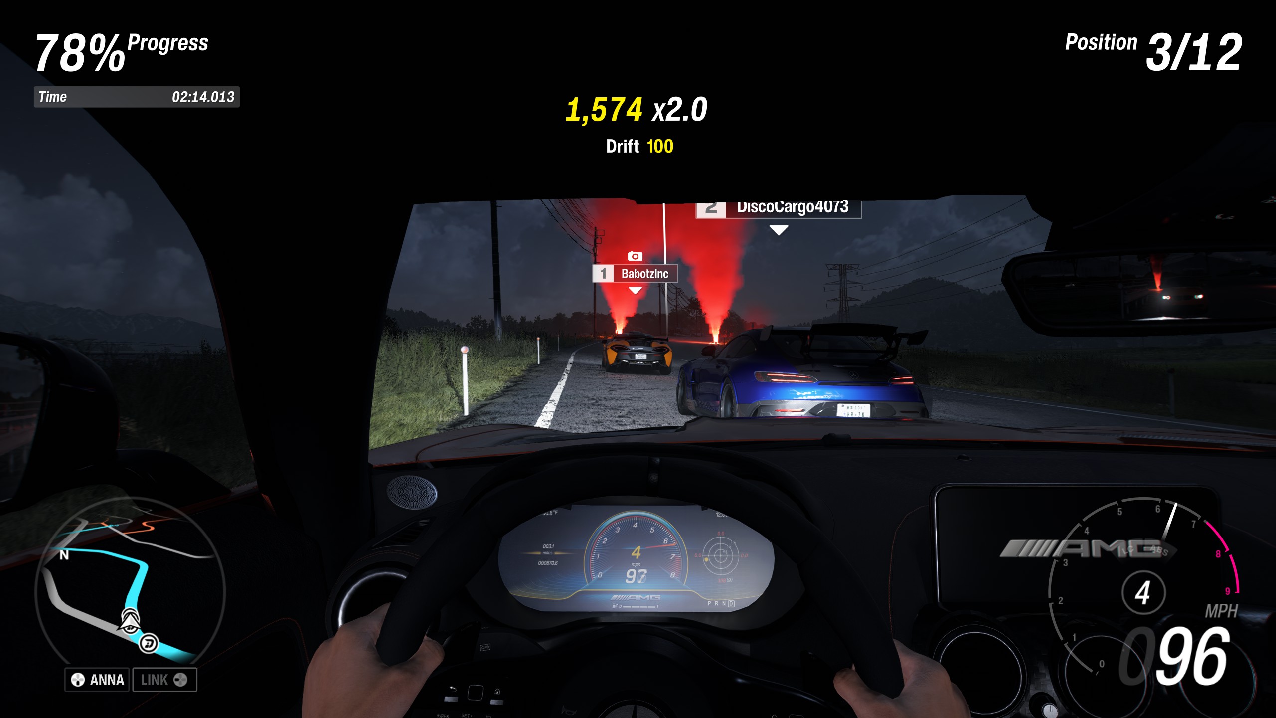 The inside of a racecar as it attempts to overtake mid-race.