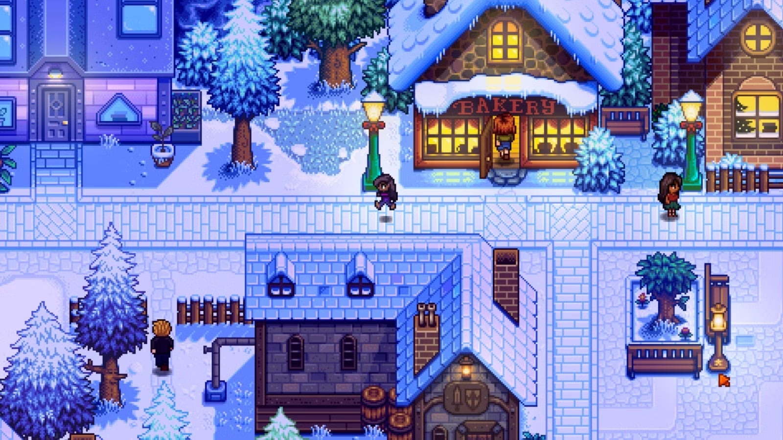 A pixel art town appears in the snow.