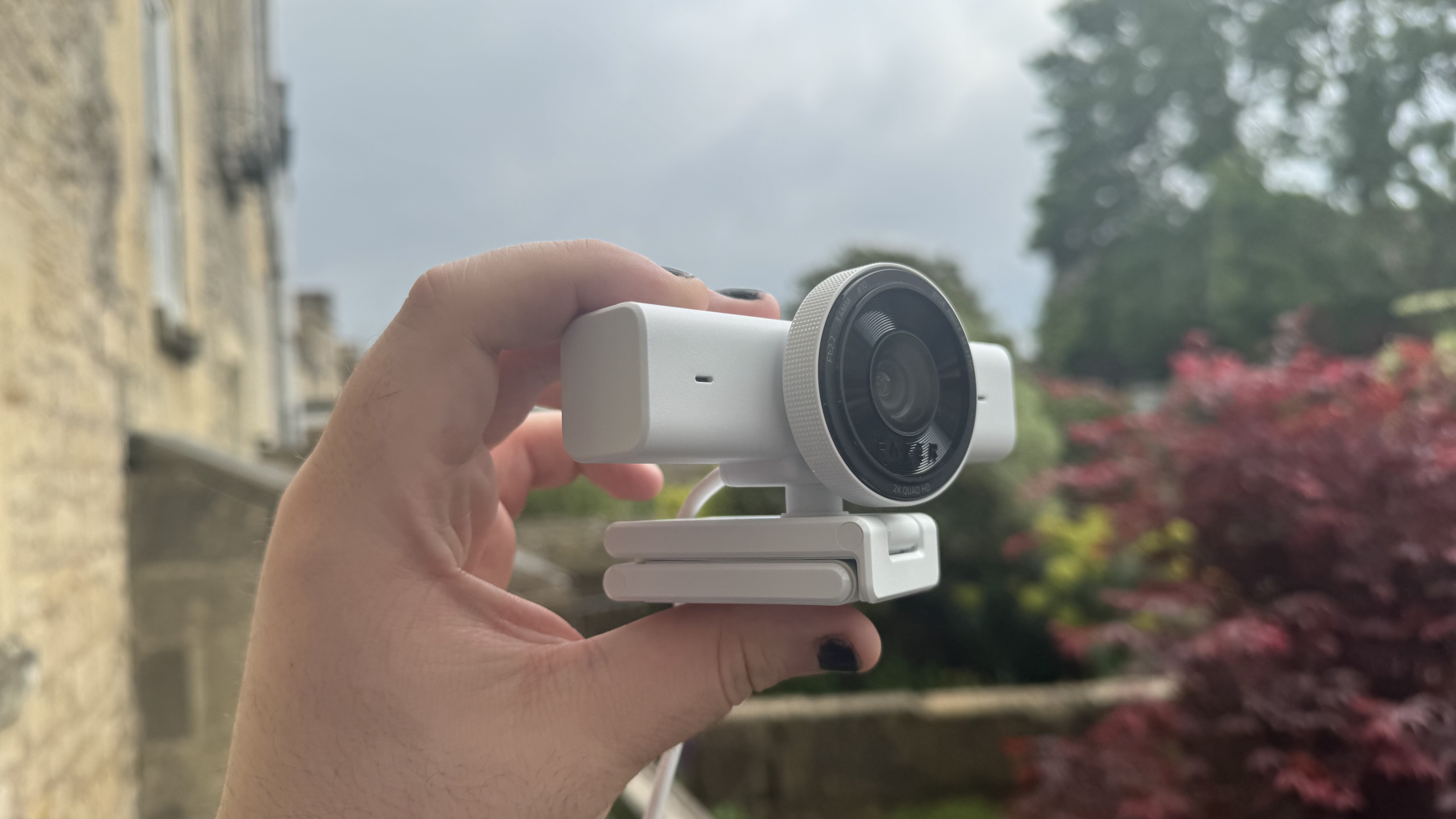The Razer Kiyo V2 X webcam from the right, showing the stand