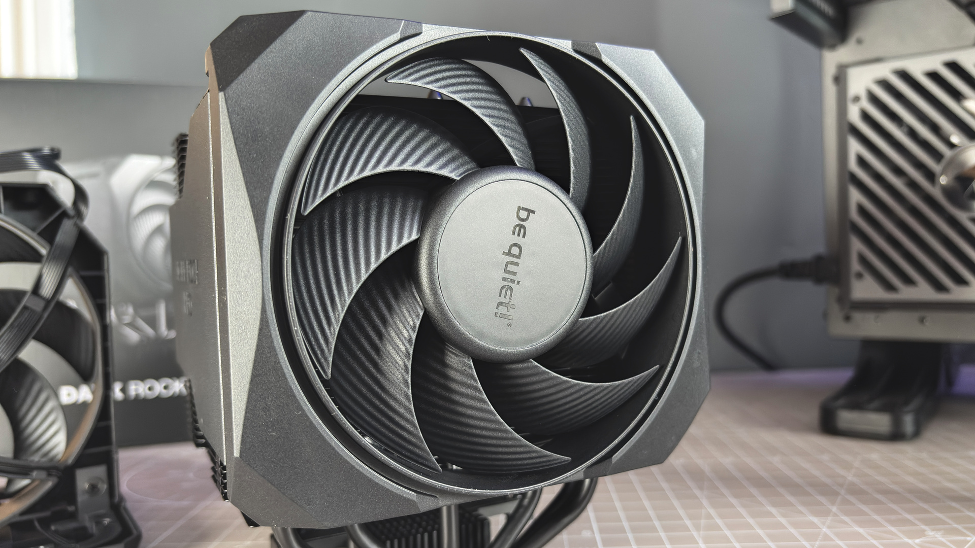 Be Quiet's latest air coolers on a box with black fans.