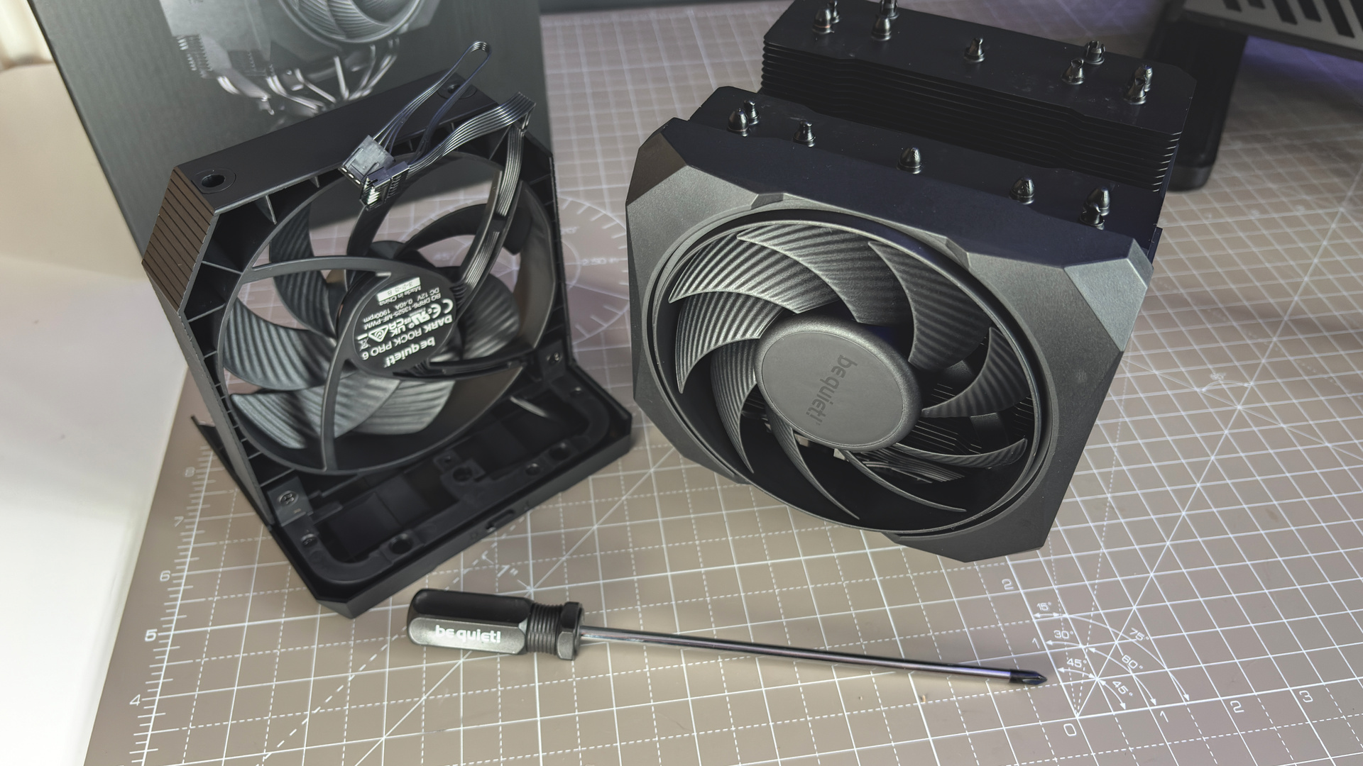 Be Quiet's latest air coolers on a box with black fans.