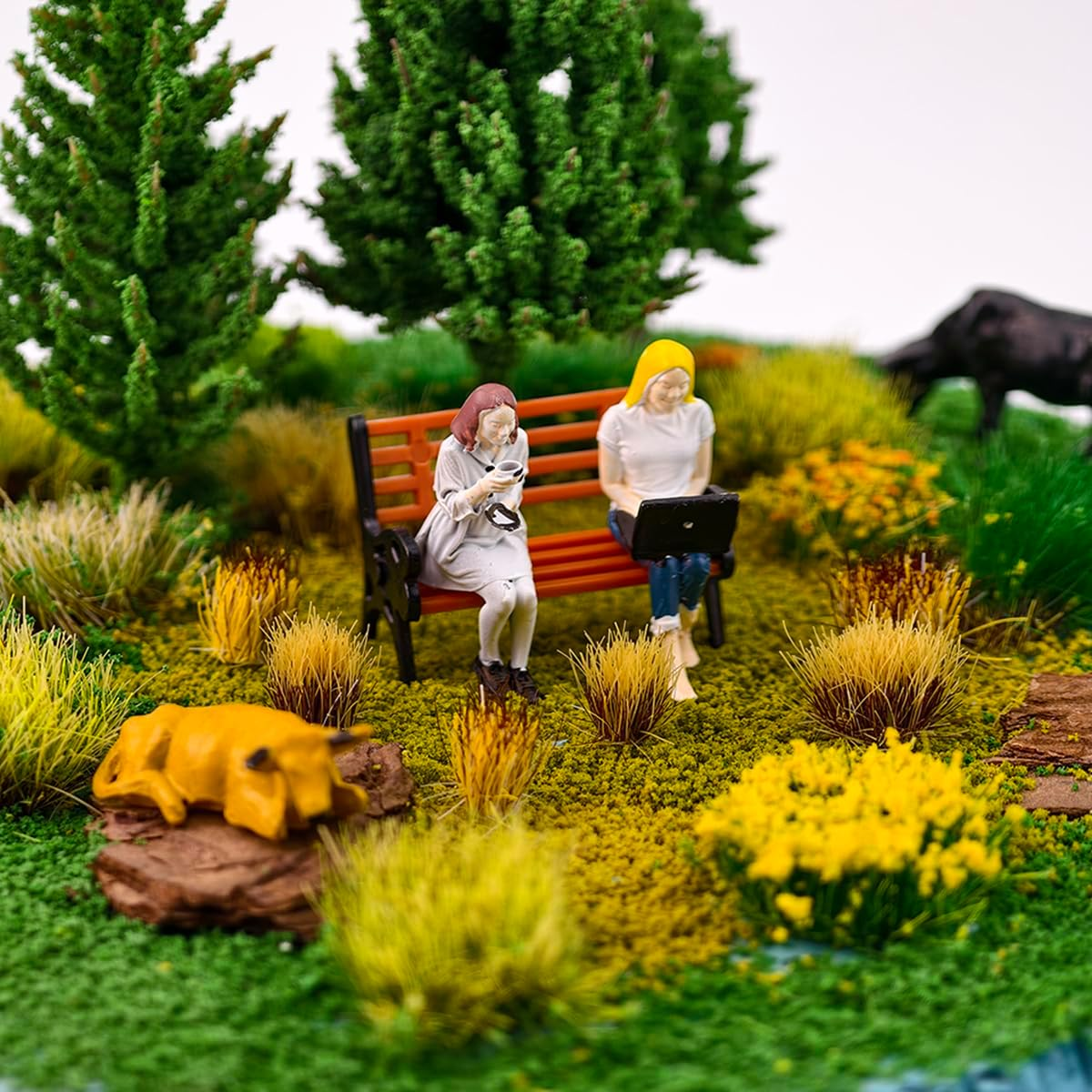 A diorama using Spriplant tufts. A dog is there.