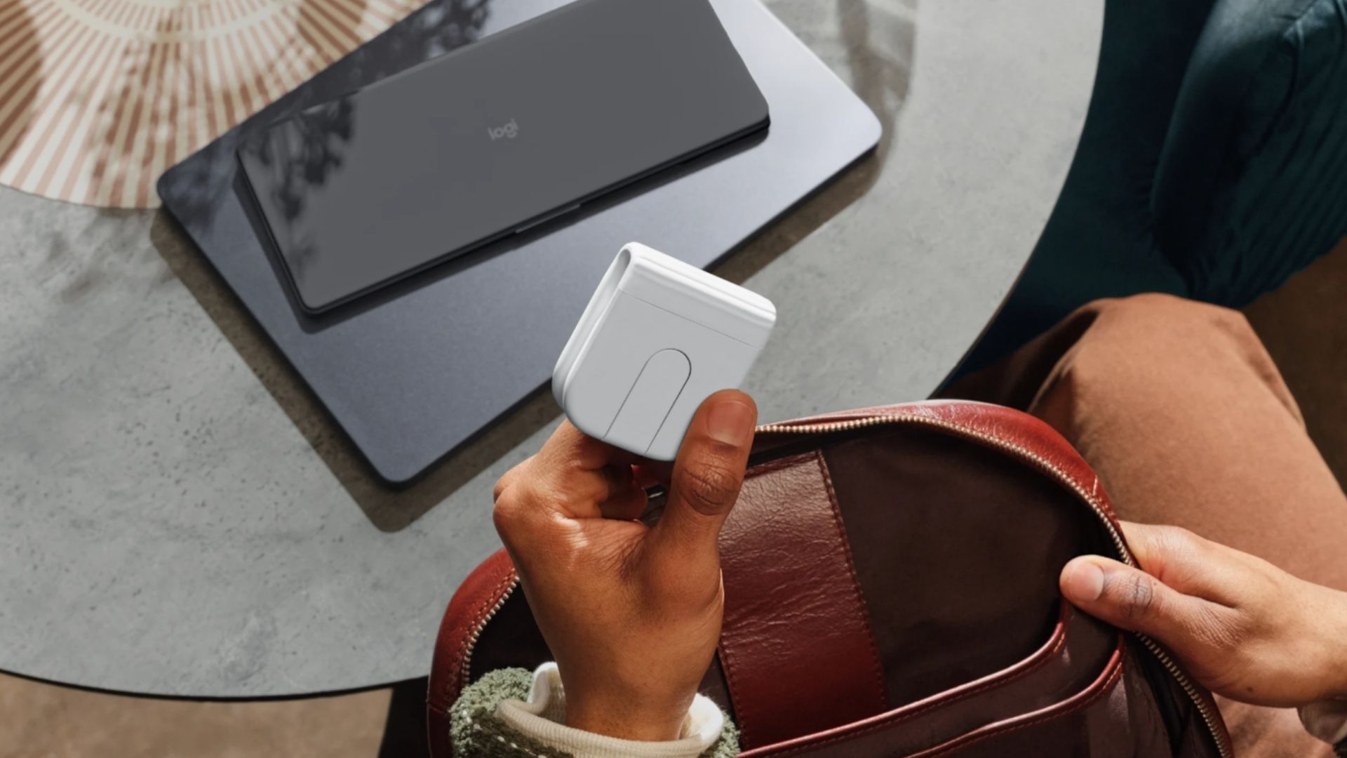 Logitech Mobi Fold going into a bag