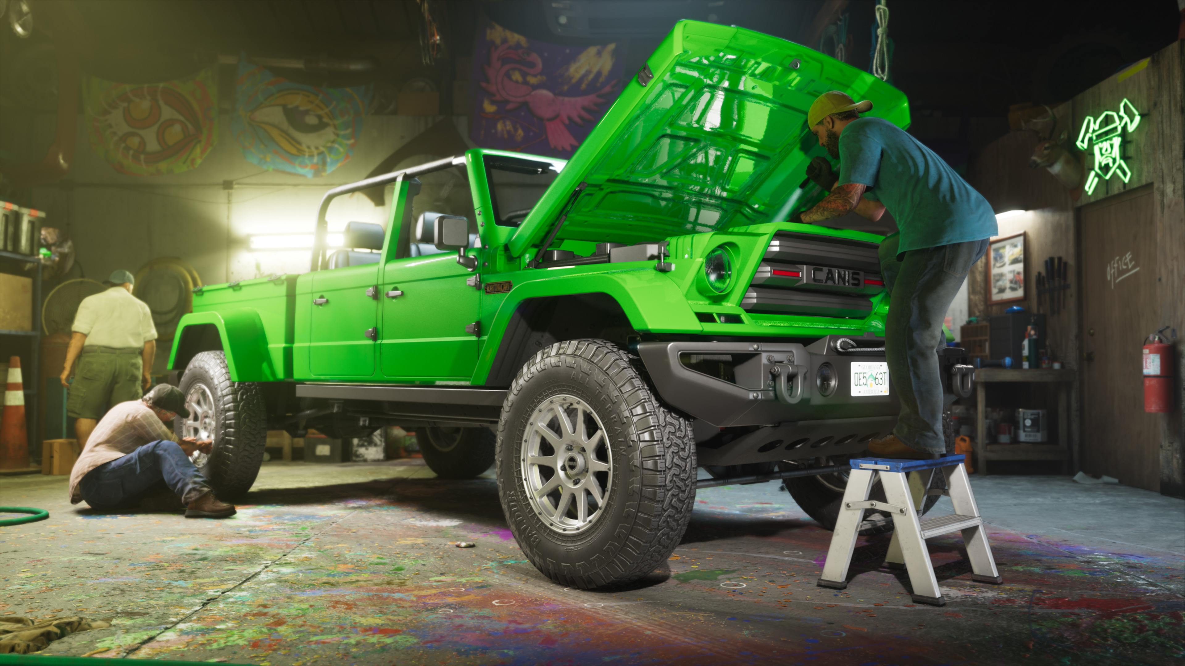 Men at workon a green truck.