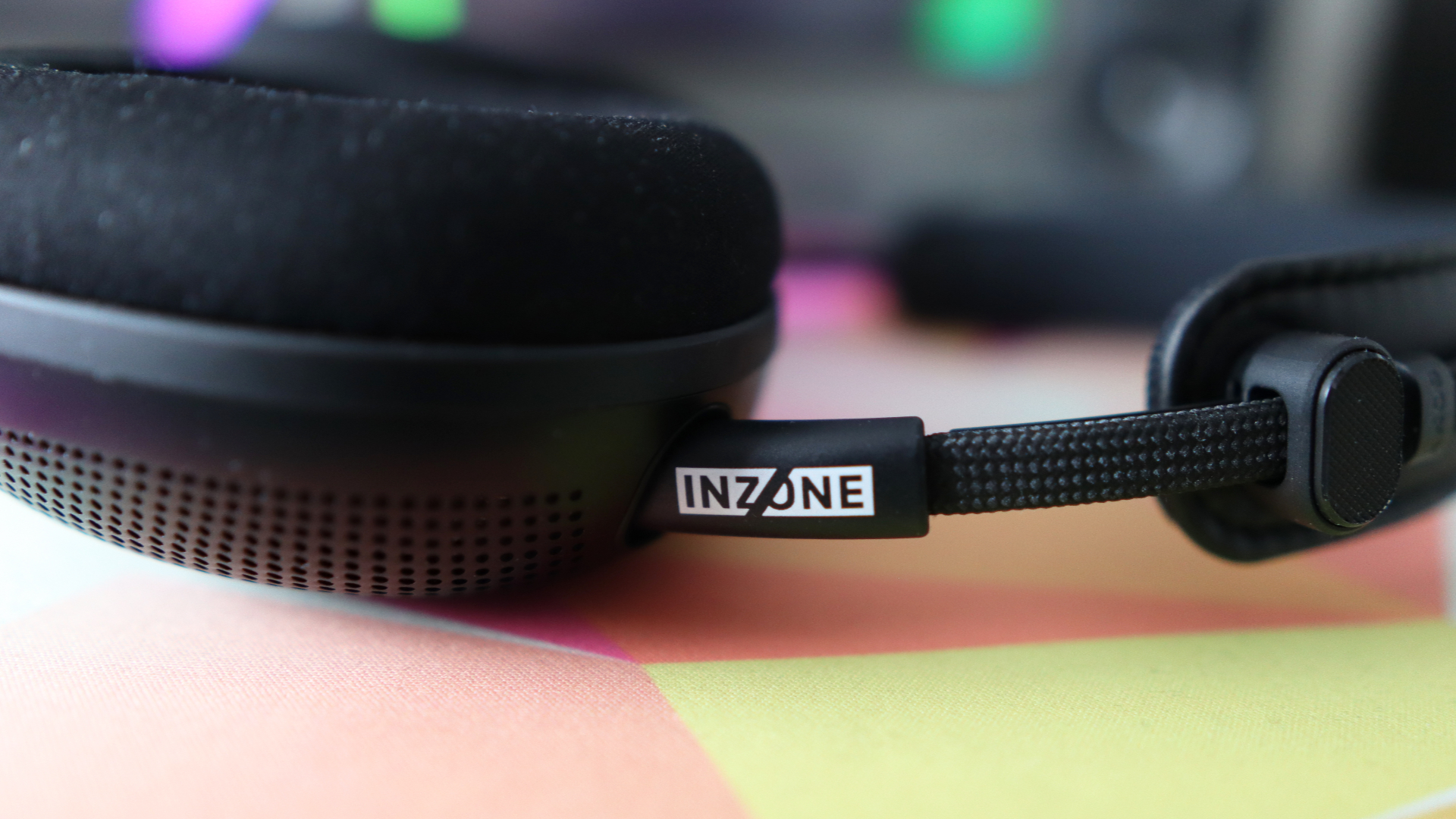 Sony Inzone H6 Air headset on a mouse pad.