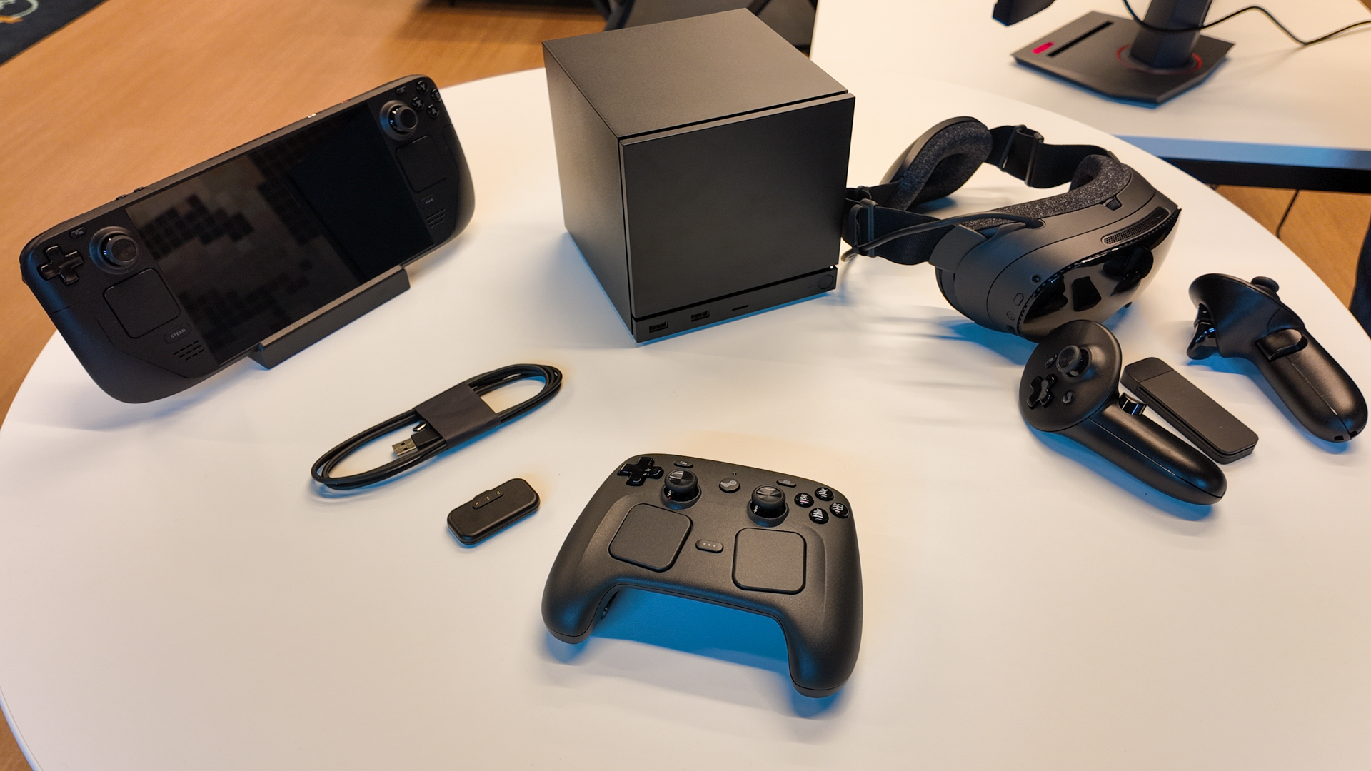 The Steam Deck alongside Valve's three new products: the Steam Machine, Steam Frame, and Steam Controller.