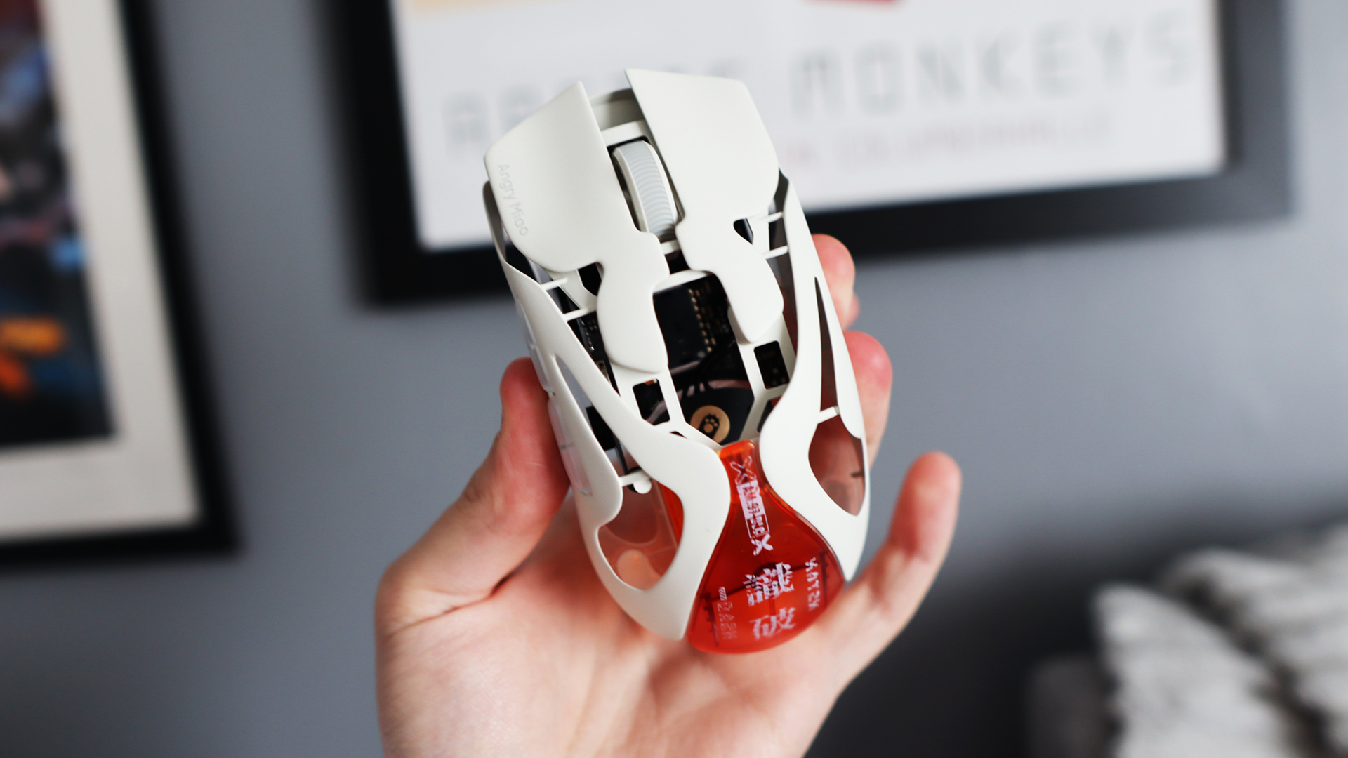 The AngryMiao AM Infinity.97 gaming mouse in hand for testing.