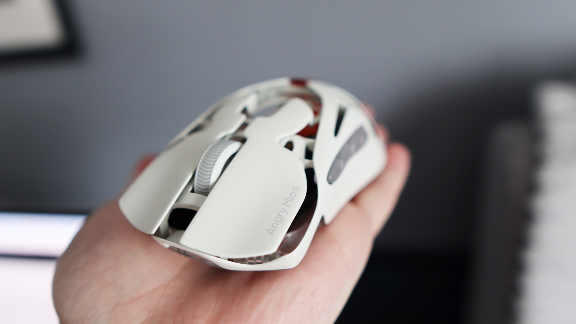The AngryMiao AM Infinity.97 gaming mouse in hand for testing.
