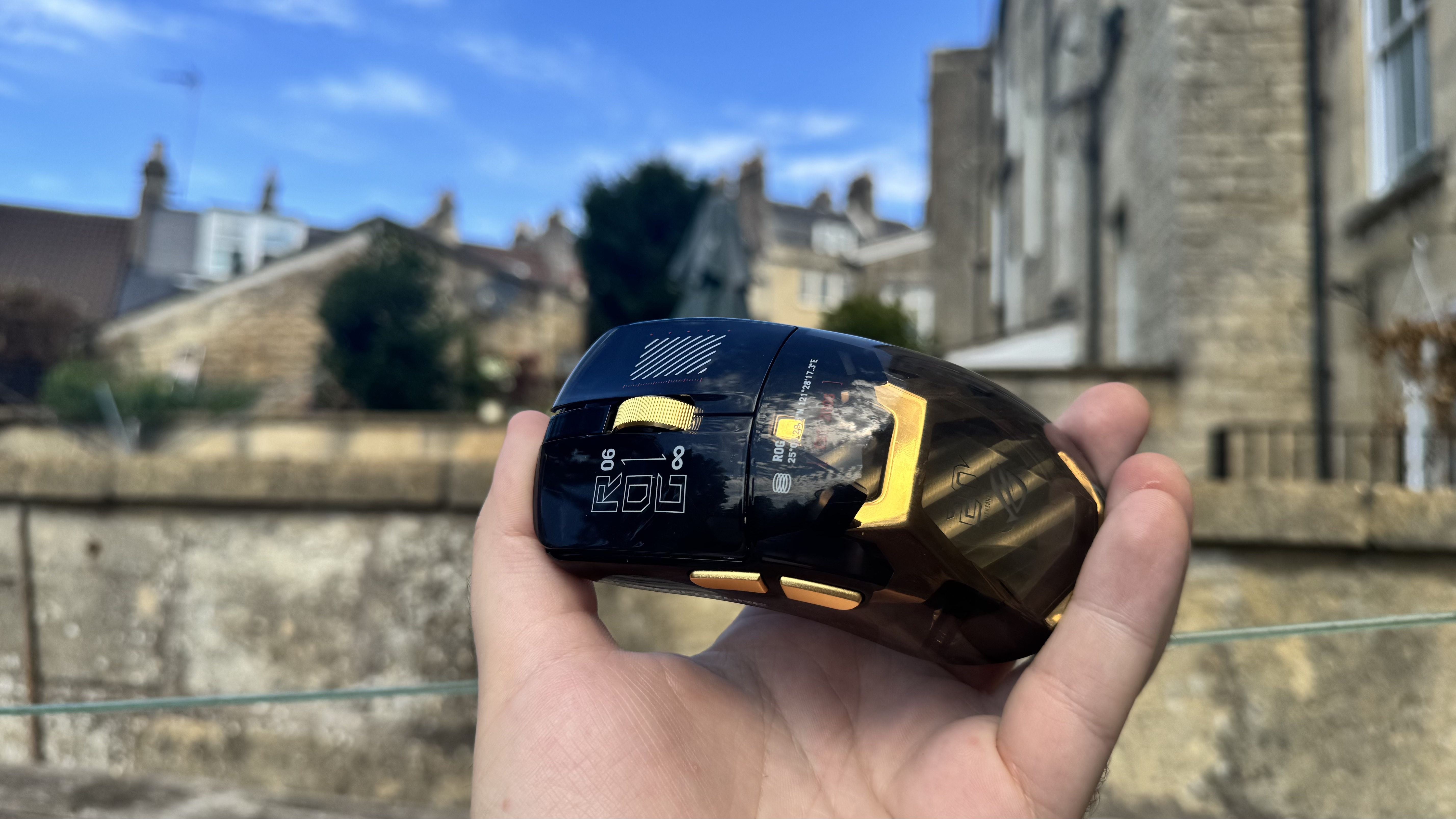 Asus ROG Harpe II Extreme Edition 20, outside in a hand, from the top