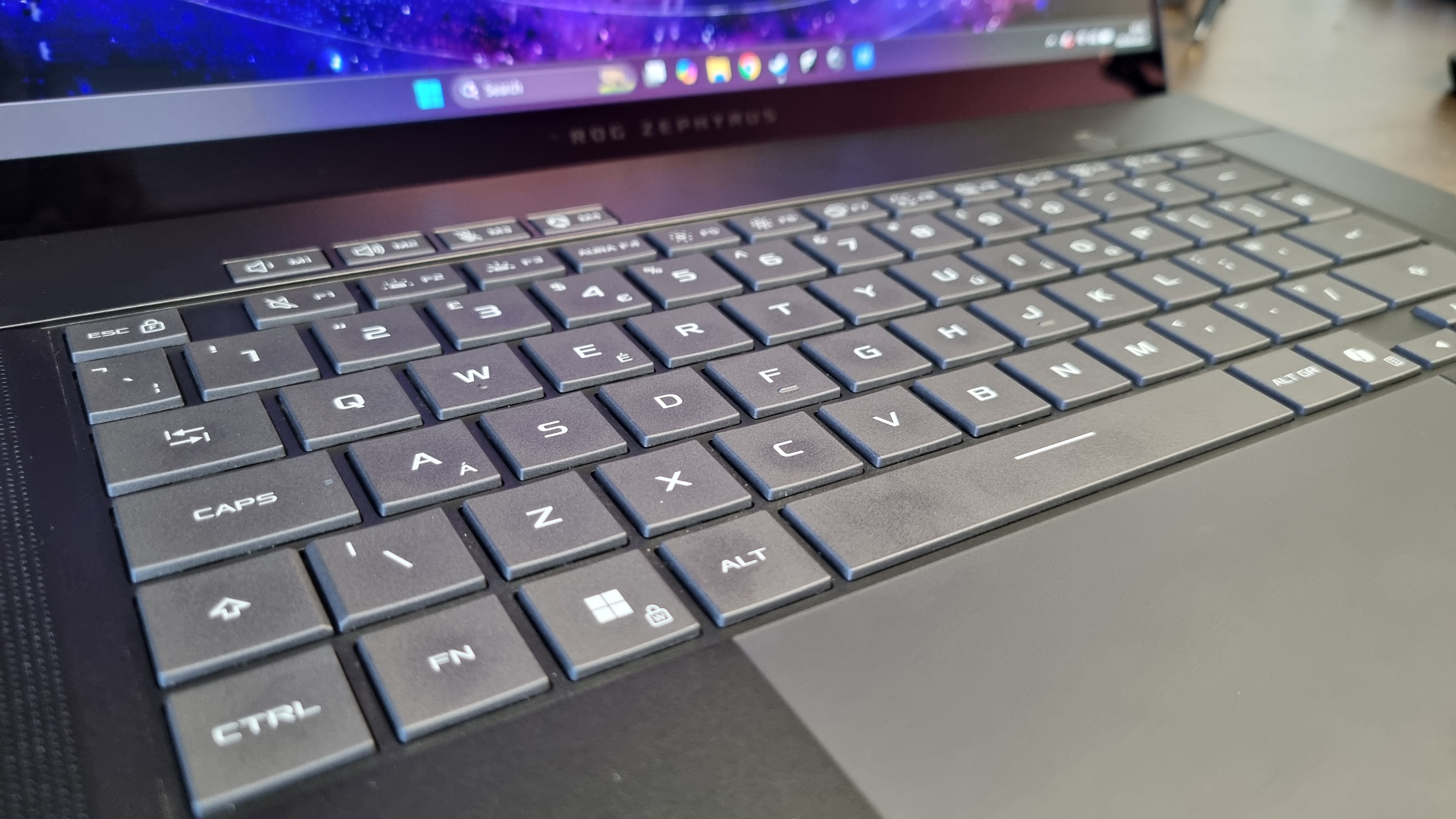 A close up of the keyboard of the Asus ROG Zephyrus G16 2026