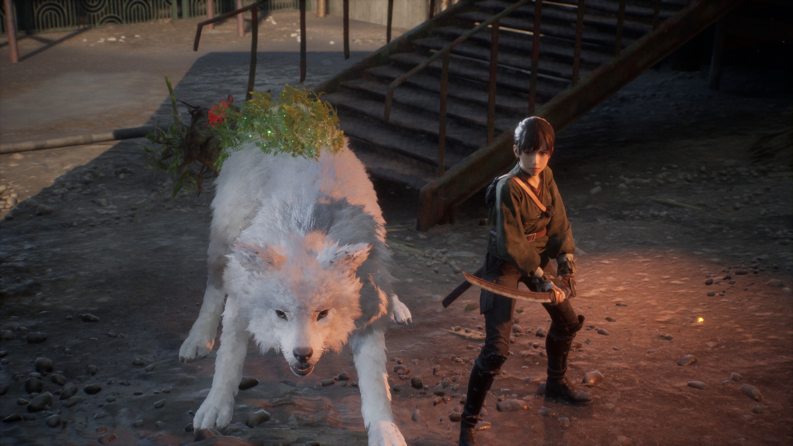 A woman and a dog stand ready for combat