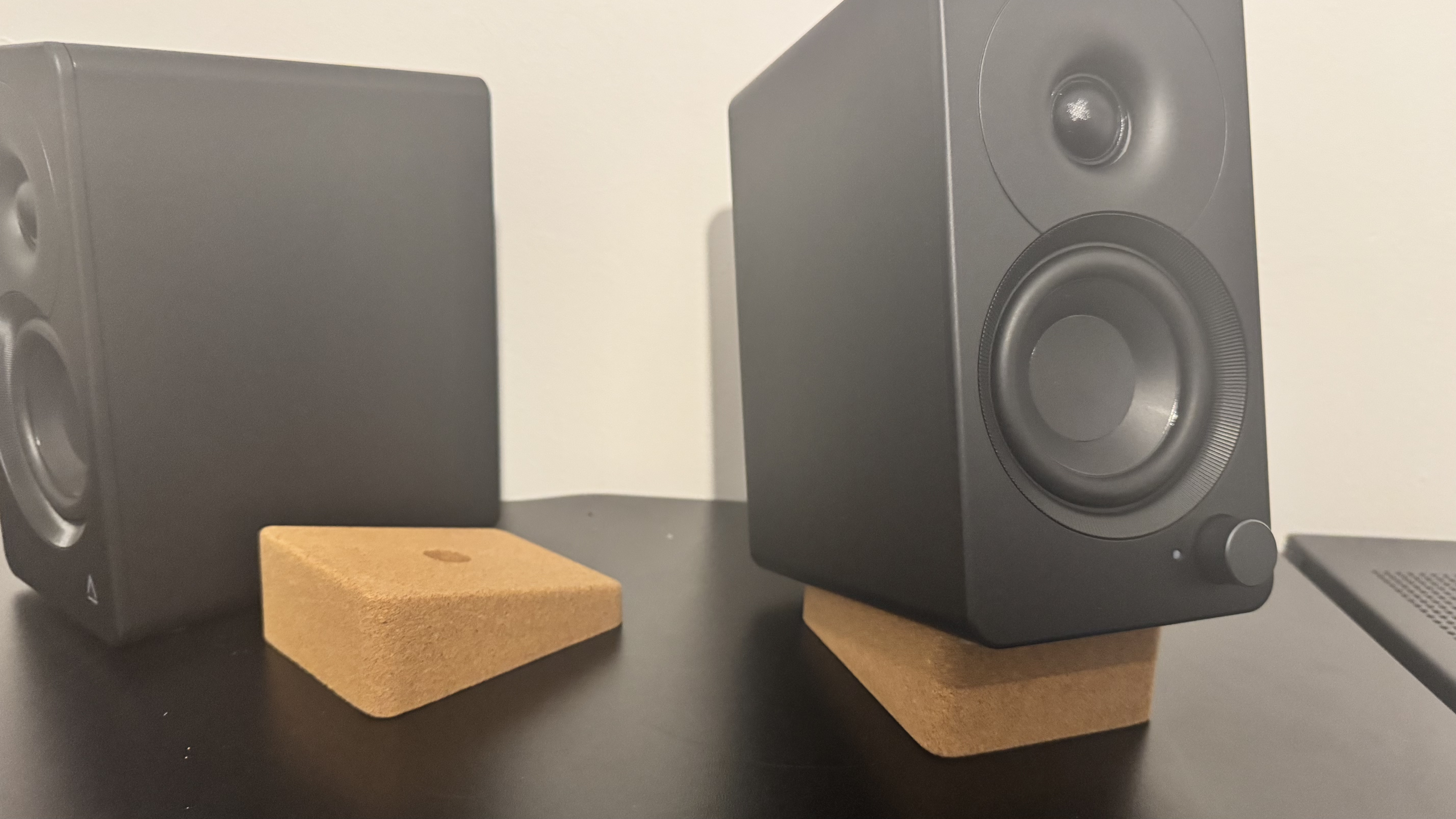 Creative XF1 speakers on a black desk