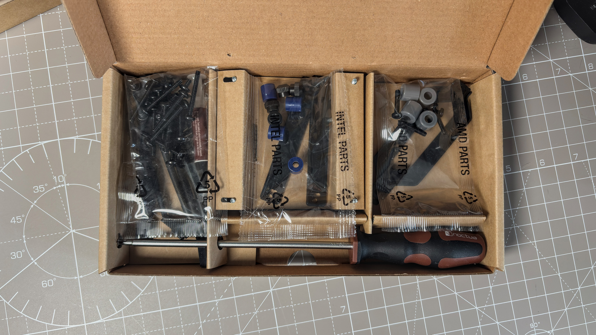 A Noctua NL-LC1 liquid cooler being installed on a test bench for testing.