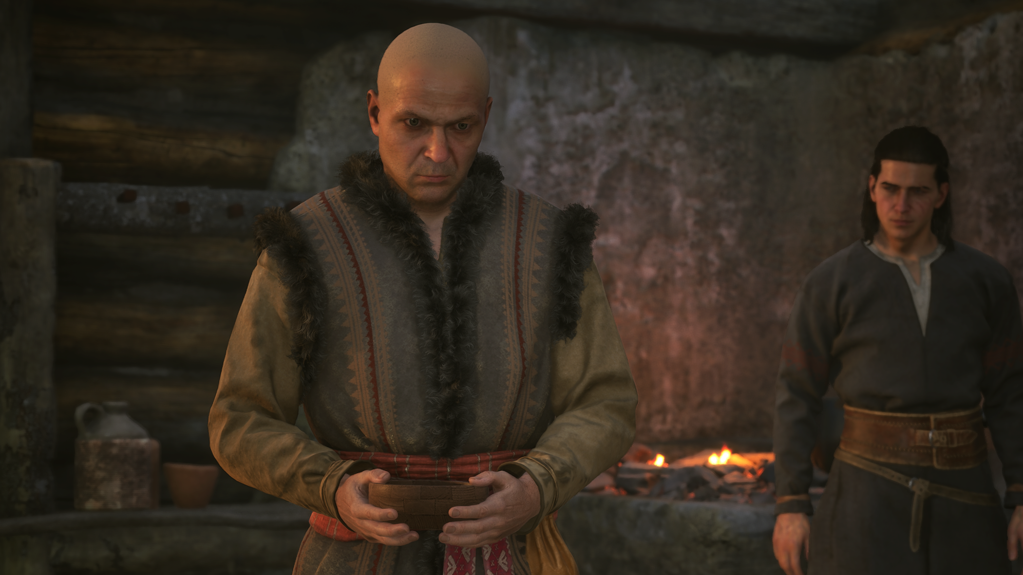 Dawnwalker - Pieter holds a bowl of medicine while Coen watches