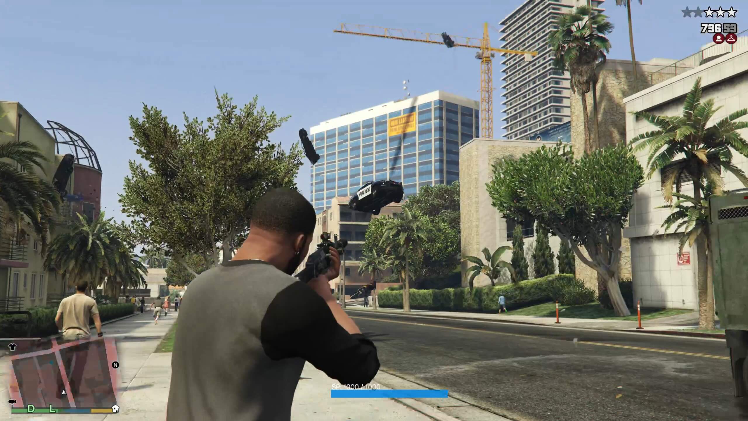 Shooting at a flying cop car.