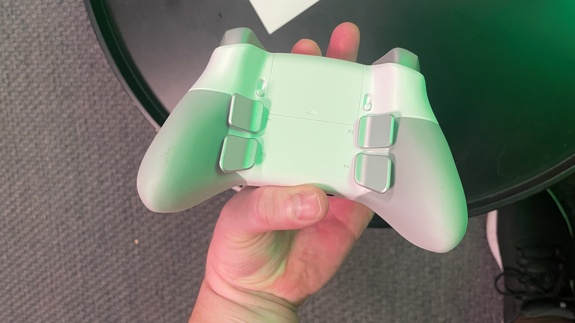 A SteelSeries Aeon Pro controller.