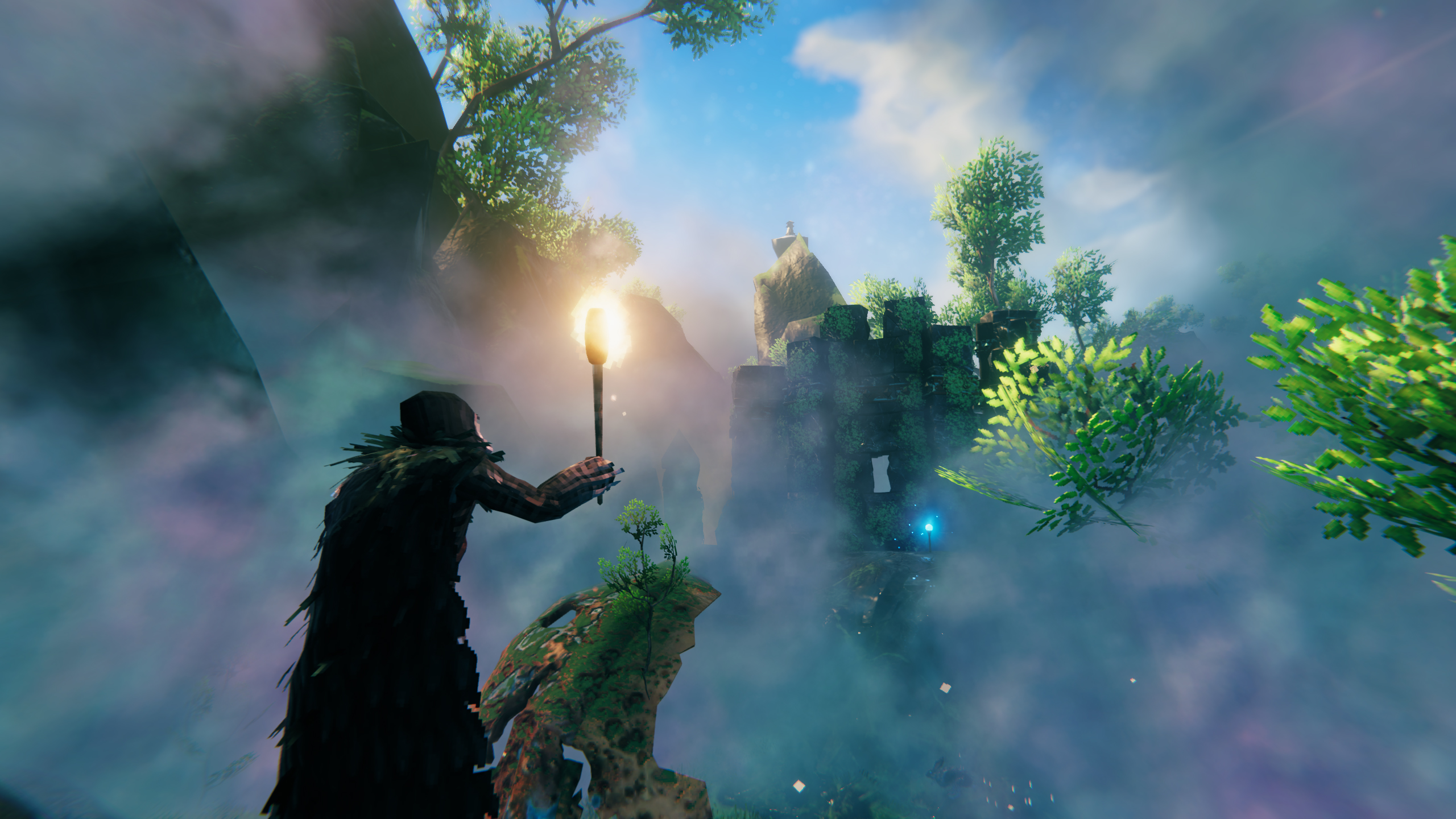 Valheim Mistlands update player holding a torch in the fog