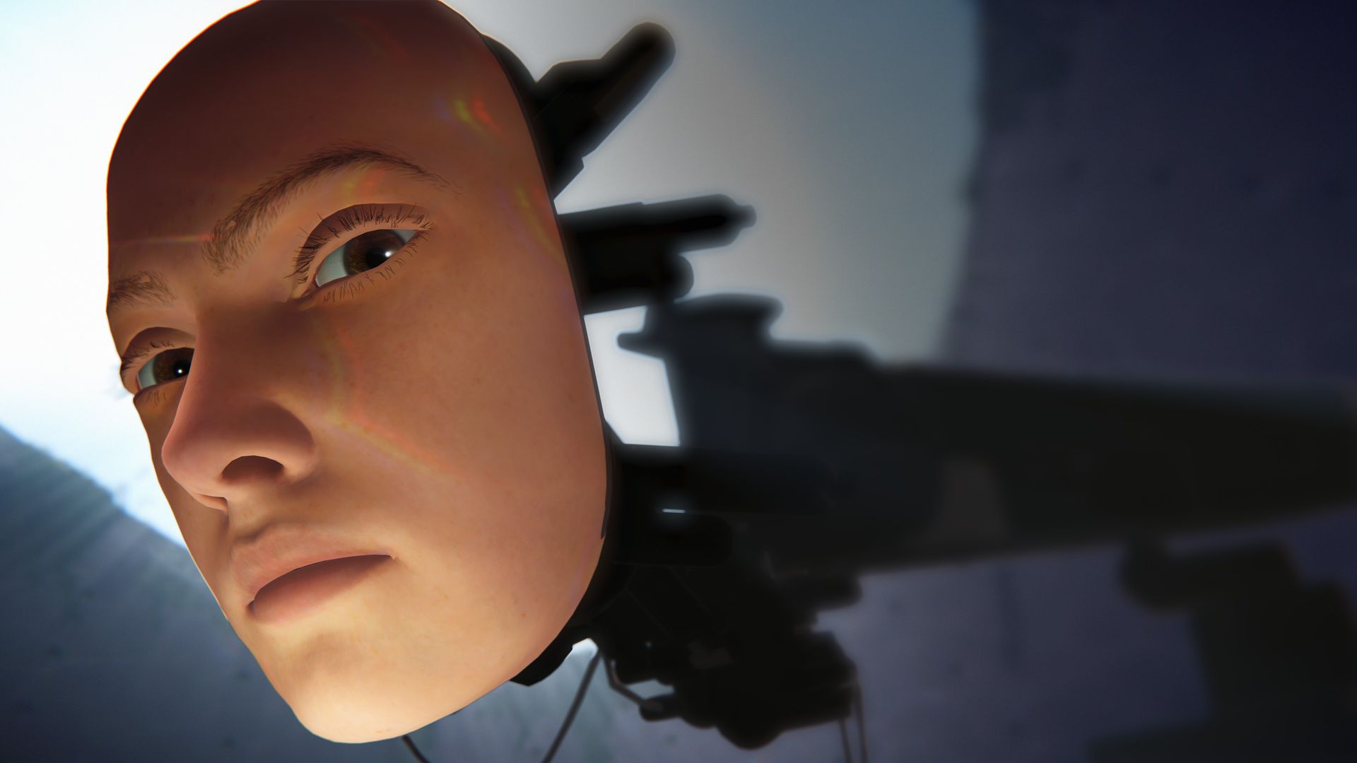 An artificial woman's face on the end of a mechanical limb
