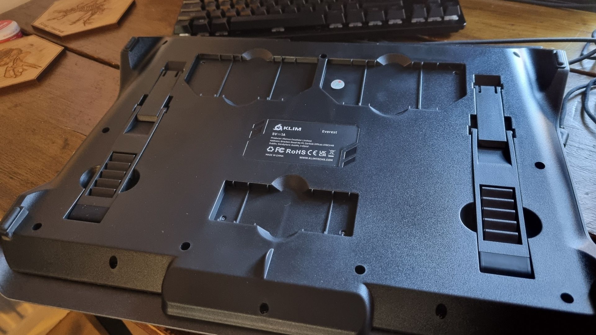 Assorted images of the Klim Everest laptop cooler, and everything included inside the box