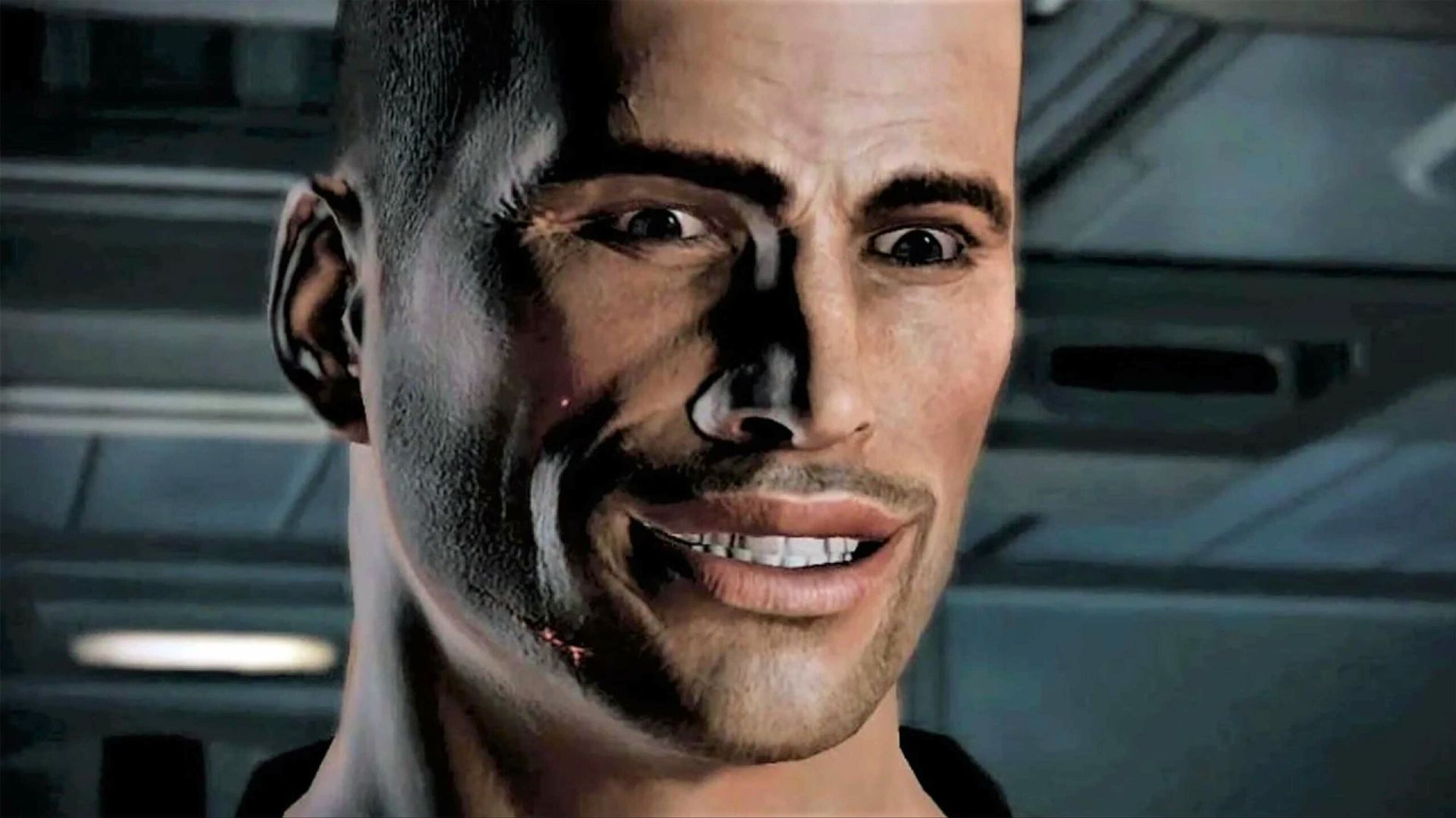 A close-up of Shephard from Mass Effect awkwardly smiling.