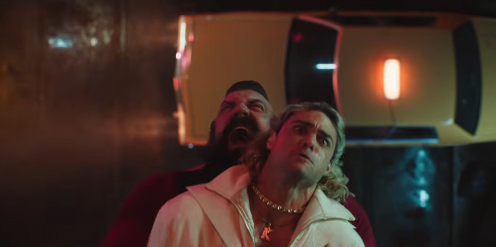 Ken about to get suplexed through a taxi by Zangief in the Street Fighter movie