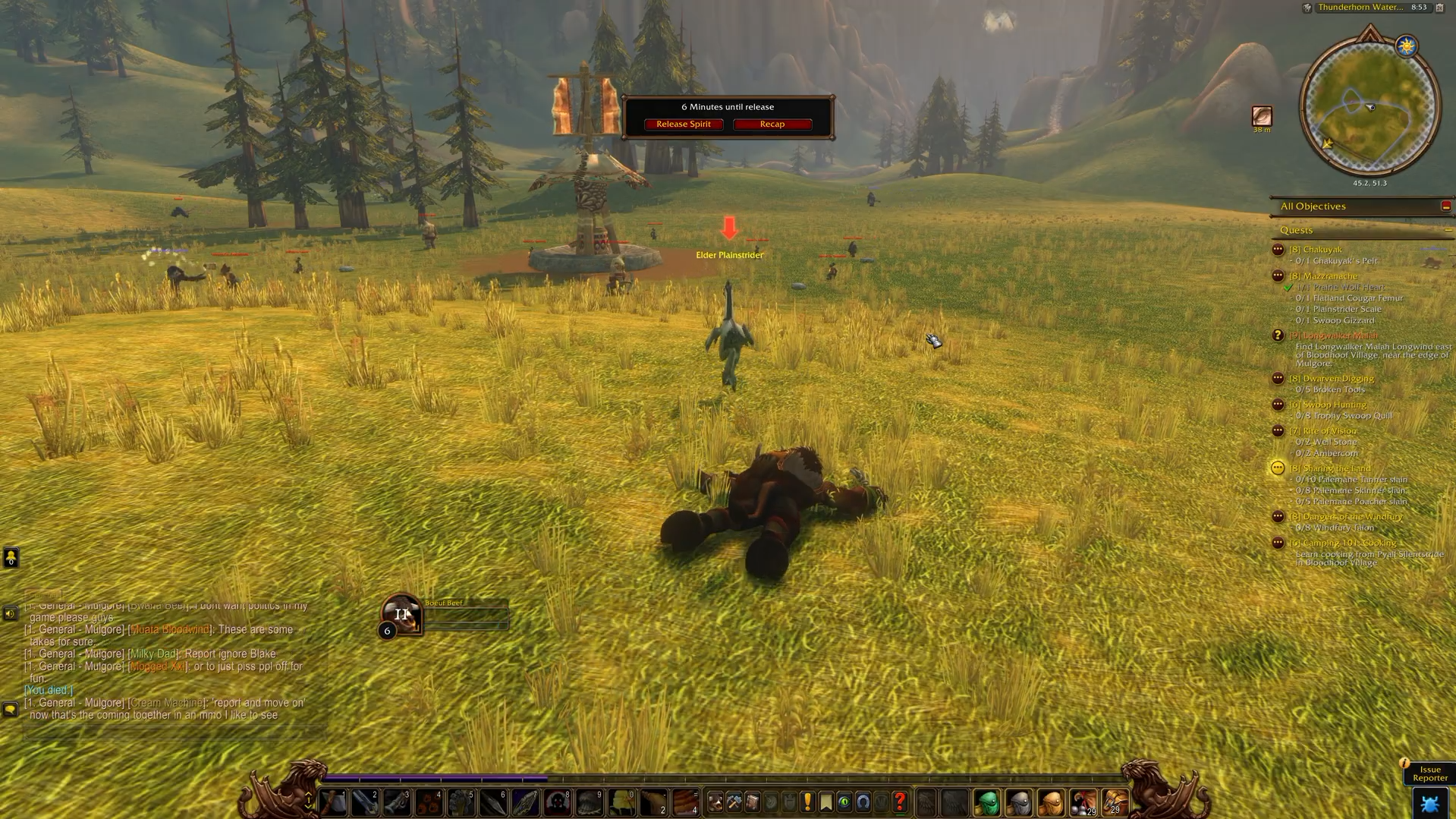 A slain tauren lies fallen in the grass of Mulgore.