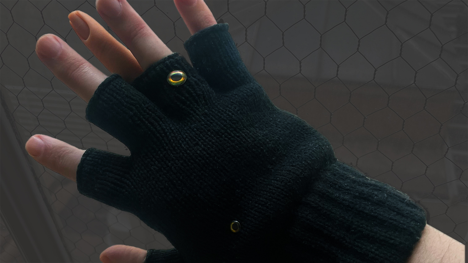 A hand with an extra, silicone finger.